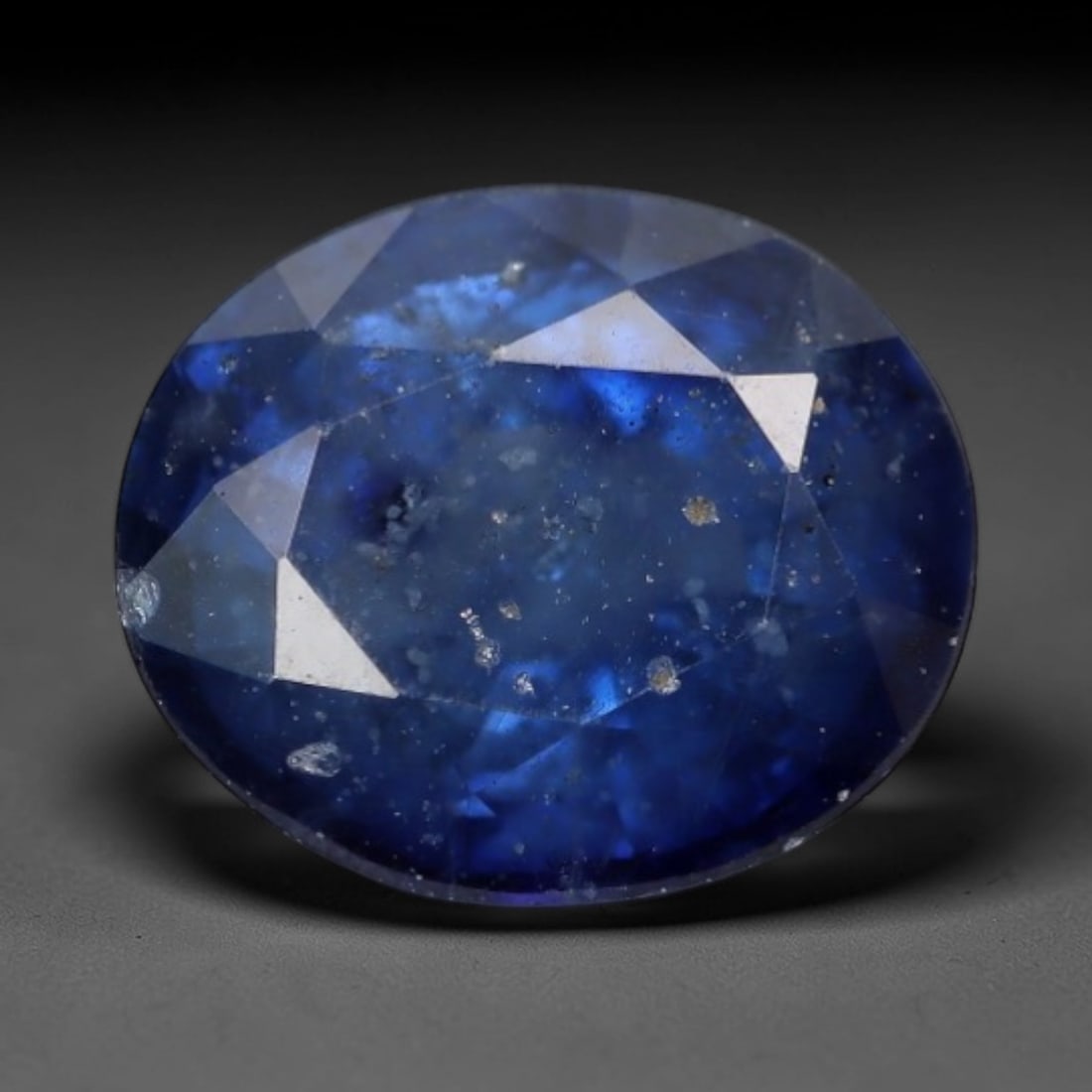 1.22ct Natural Layered Cornflower Blue Oval Sapphire Loose Faceted Gemstone, LZ307: This natural oval faceted sapphire weighs 1.22 carats with precise dimensions of 6.7x5.7x3.6mm. It showcases soft layered cornflower blue tones, blending vivid medium blue core with pale translucent g