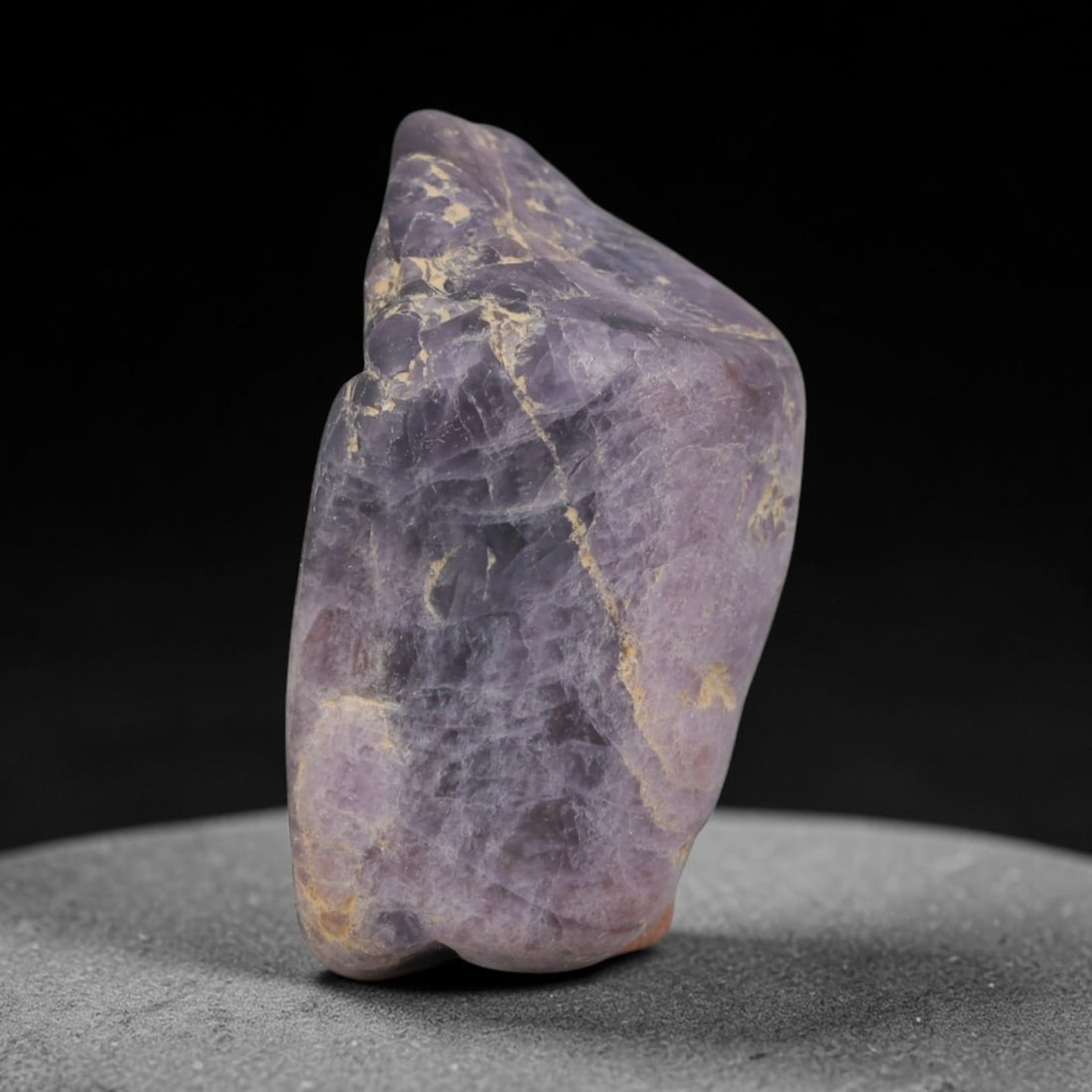 47ct Natural Unheated Sri Lankan Purplish Blue Sapphire Rough, 53YQ: This natural corundum rough is an unheated purplish blue sapphire sourced from Sri Lankan alluvial gem deposits, featuring an irregular natural native form with residual pale yellow-brown mineral matr
