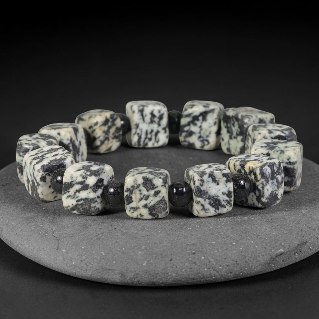 Natural Black White Dendritic Jasper Cube Beaded Bracelet, 39TA: Handmade bracelet featuring 10.6mm smooth rounded square cube dendritic jasper beads with distinctive natural black moss-like dendritic veining across a creamy white base. Each cube bead is spaced wit