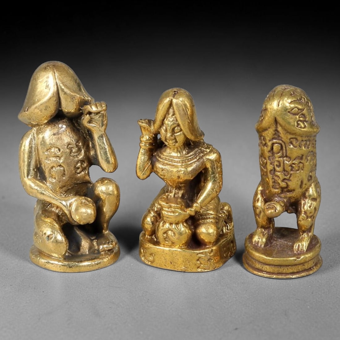 Thai Vintage Copper Alloy Love & Wealth Sacred Devotional Figures - 3pcs Set, 88YY: Mini vintage copper alloy folk ritual figurine set of three pieces, each measuring 3.0x1.5cm. This set includes a sacred phallic totem statue, a kneeling female wealth deity holding fortune pouch, and