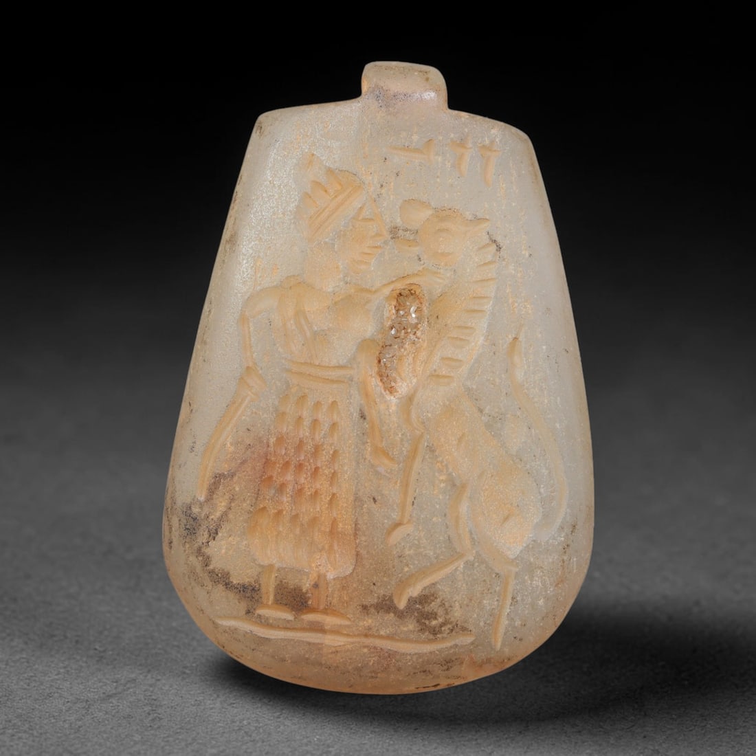 Ancient Sasanian Hand Engraved Chalcedony Plaque Amulet, 39WT: Mid-sized antique wearable sacred tablet expertly carved from natural translucent chalcedony mineral, originating from ancient Sasanian Persian cultural and devotional craft traditions. Chalcedony was