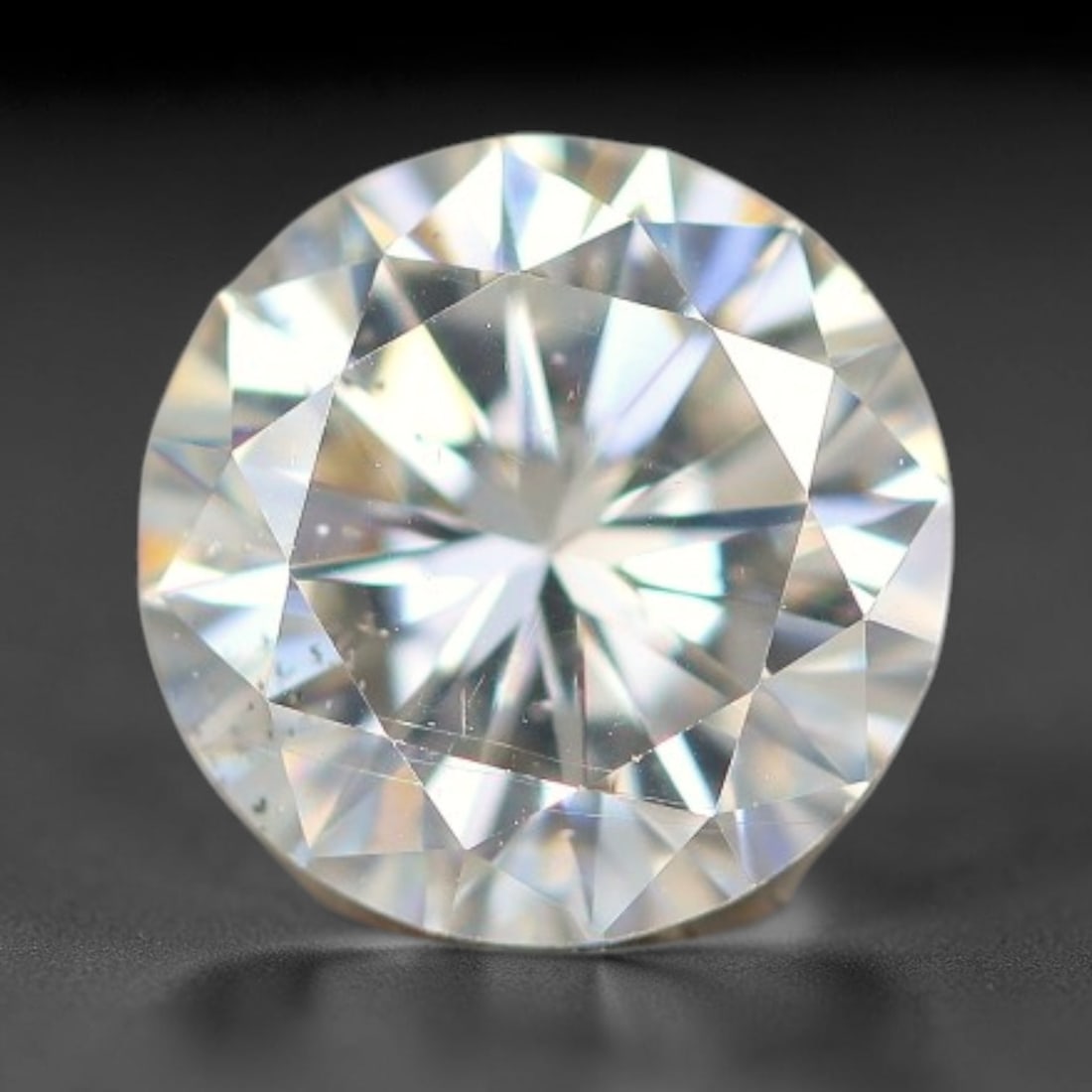 0.93 Carats Clear Moissanite Loose Gemstone, 40WP: This moissanite features dimensions of 6.4x3.8mm, a lab-created silicon carbide gemstone prized for its exceptional refractive index that generates brilliant light dispersion and consistent sparkle in