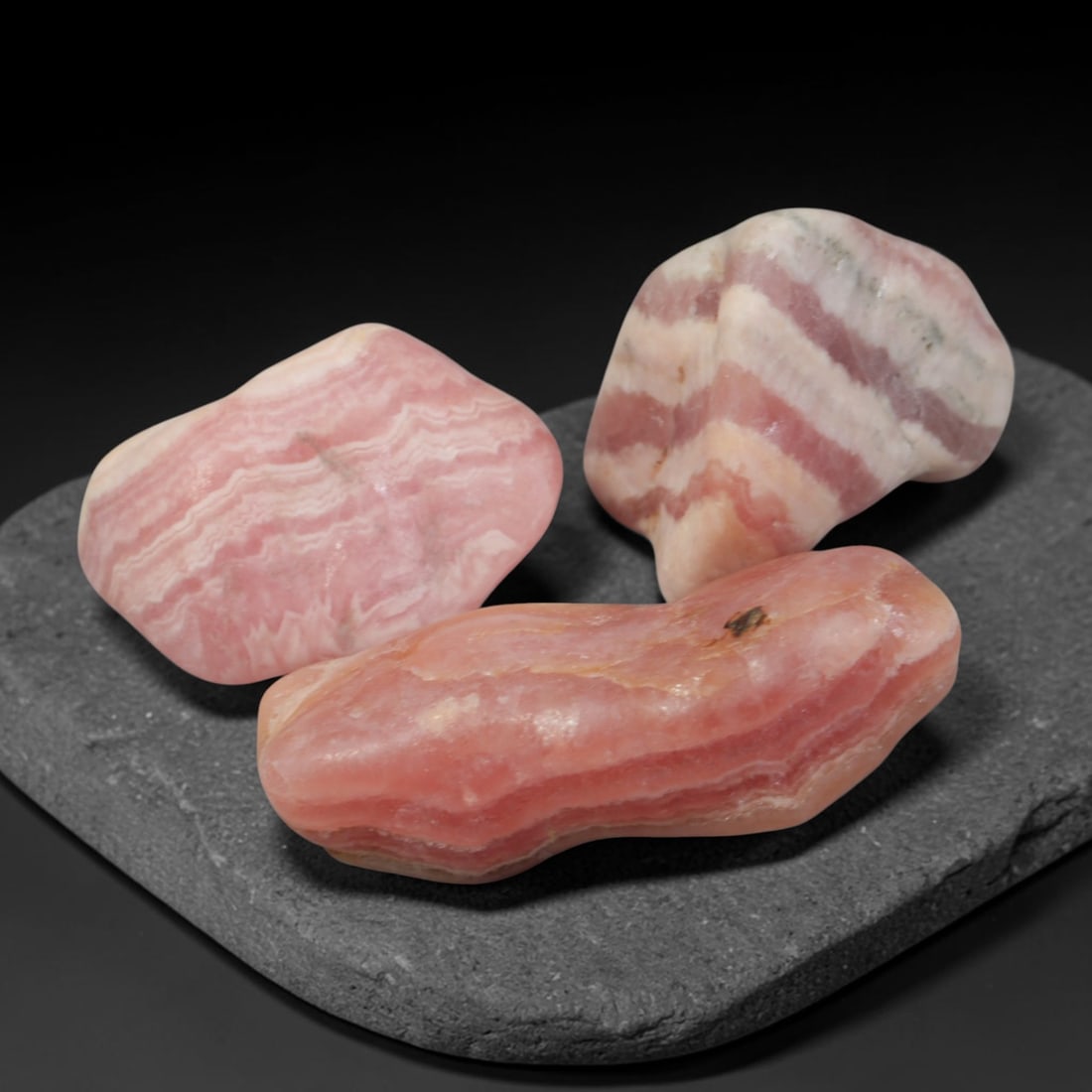 74ct 3pcs Natural Argentine Rhodochrosite Banded Tumbled Rough Set, 9YR: This listing features three individual tumbled rhodochrosite rough pieces sourced from Argentina Capillitas deposits, each showcasing distinct layered banding of soft rose pink, cream white and pale t