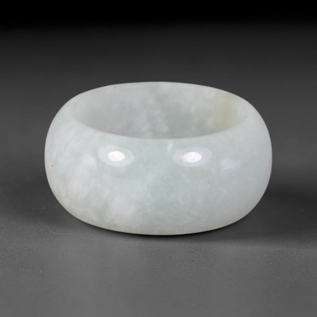 Natural Burmese Type A Jadeite Jade Band Ring Size US 9, 41TB: Crafted from untreated natural Burmese Type A jadeite jade, this solid stone band features a high-gloss polished finish displaying consistent deep green mineral tones interwoven with natural subtle to