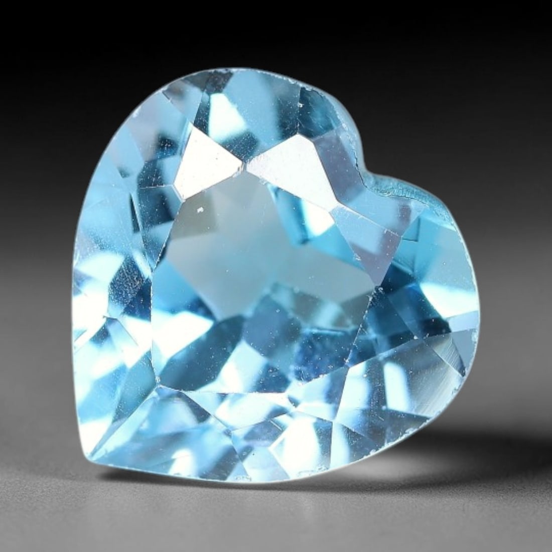 6.53 Carats Natural Brazilian Sky Blue Topaz Heart Faceted Loose Gemstone, 25XY: Constructed from genuine natural topaz sourced from Brazilian mineral deposits, the raw material has been refined through professional faceted lapidary processing with consistent glossy polishing acro