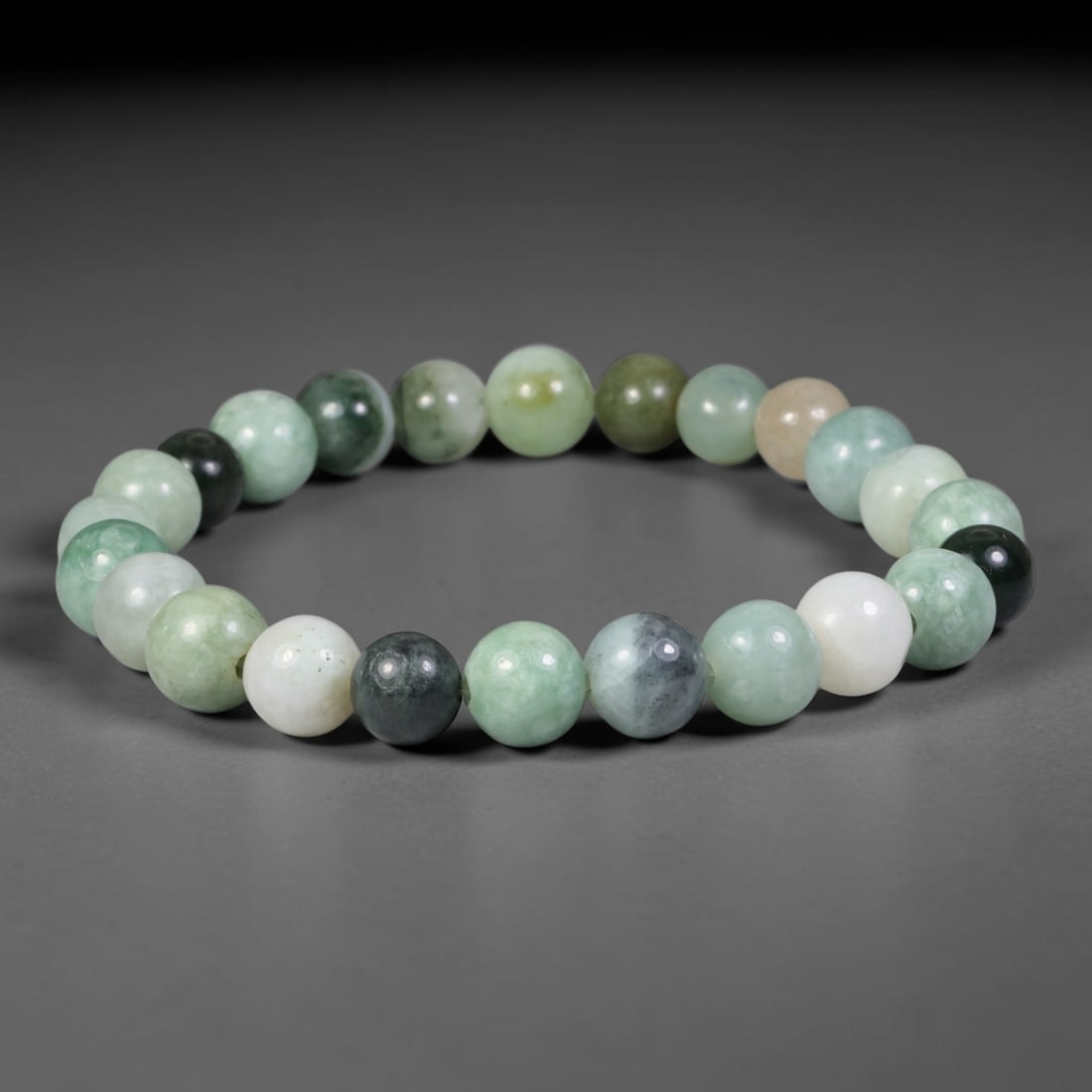 Natural Burmese Type A Multi-Color Mixed Jadeite Jade Beaded Bracelet, 73TA: Expertly handmade from fully untreated genuine Burmese Type A jadeite, this bracelet features smoothly polished uniform round beads blending a rich palette of milky white, light celadon green, dark in