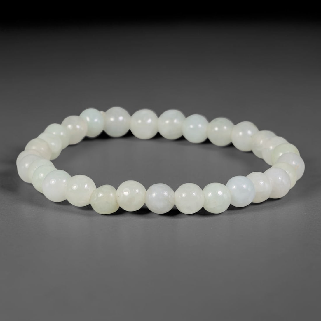 Natural Burmese Type A Pure Pale White Jadeite Jade Beaded Bracelet, 35TA: Crafted from untreated natural Burmese Type A jadeite jade beads with maximum bead dimension of 6.92mm, this classic single-loop bracelet features uniformly polished round beads in soft milky pale whi