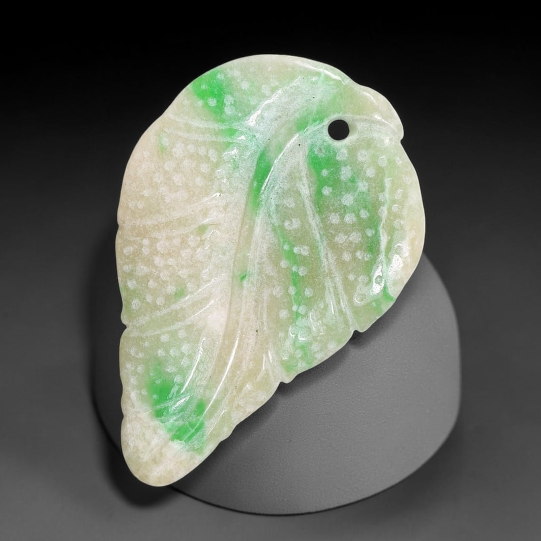 Natural Burmese Type A Jadeite Jade Hand Carved Pendant, 23TC: Artisan hand-carved untreated Burmese Type A jadeite jade pendant measuring 32x21 mm. Carefully sculpted with detailed relief craftsmanship and finished with a smooth glossy polish. Authentic Type A j