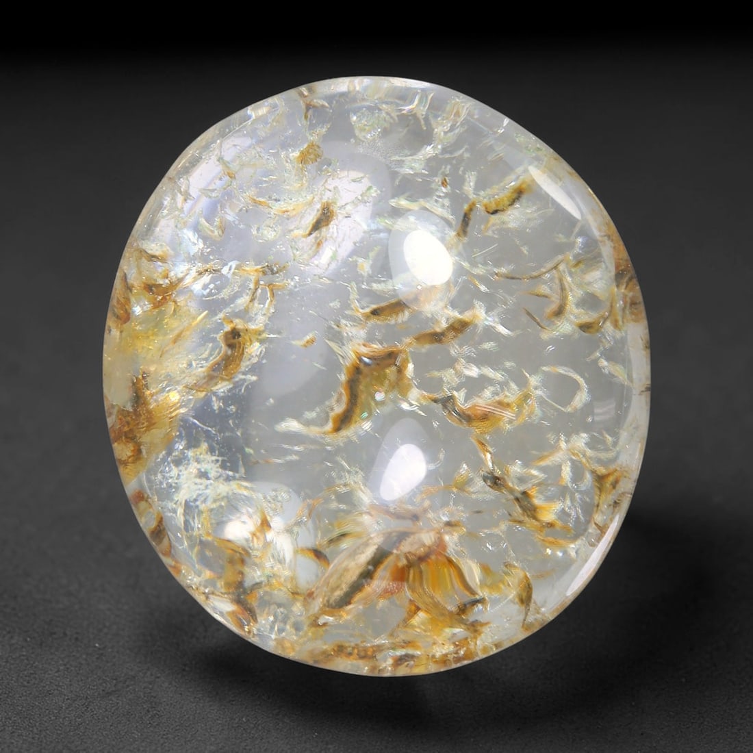 26.77ct Natural Brazilian Phantom Quartz Oval Cabochon Loose Gemstone, 30YX: This smoothly polished cabochon of natural phantom quartz preserves delicate layered phantom crystal formations enclosed inside transparent quartz host. The domed polished surface offers unobstructed 