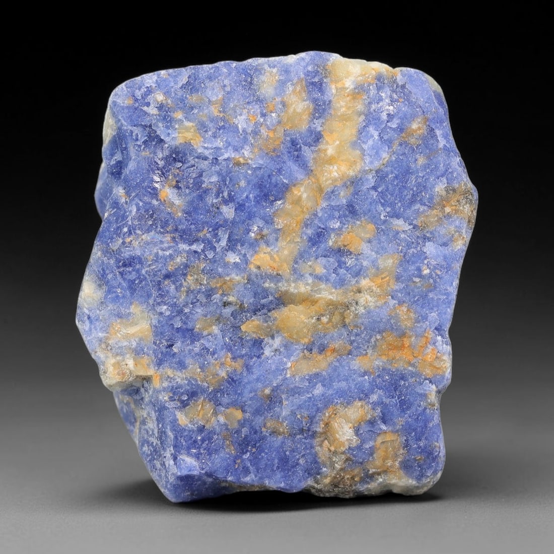 111 Carats Natural Royal Blue Sodalite Rough Stone, 20YS: This genuine natural sodalite rough exhibits soft blended royal blue mineral coloration mixed with pale crystalline matrix formed through natural igneous geological formation. Fine light mineral speck