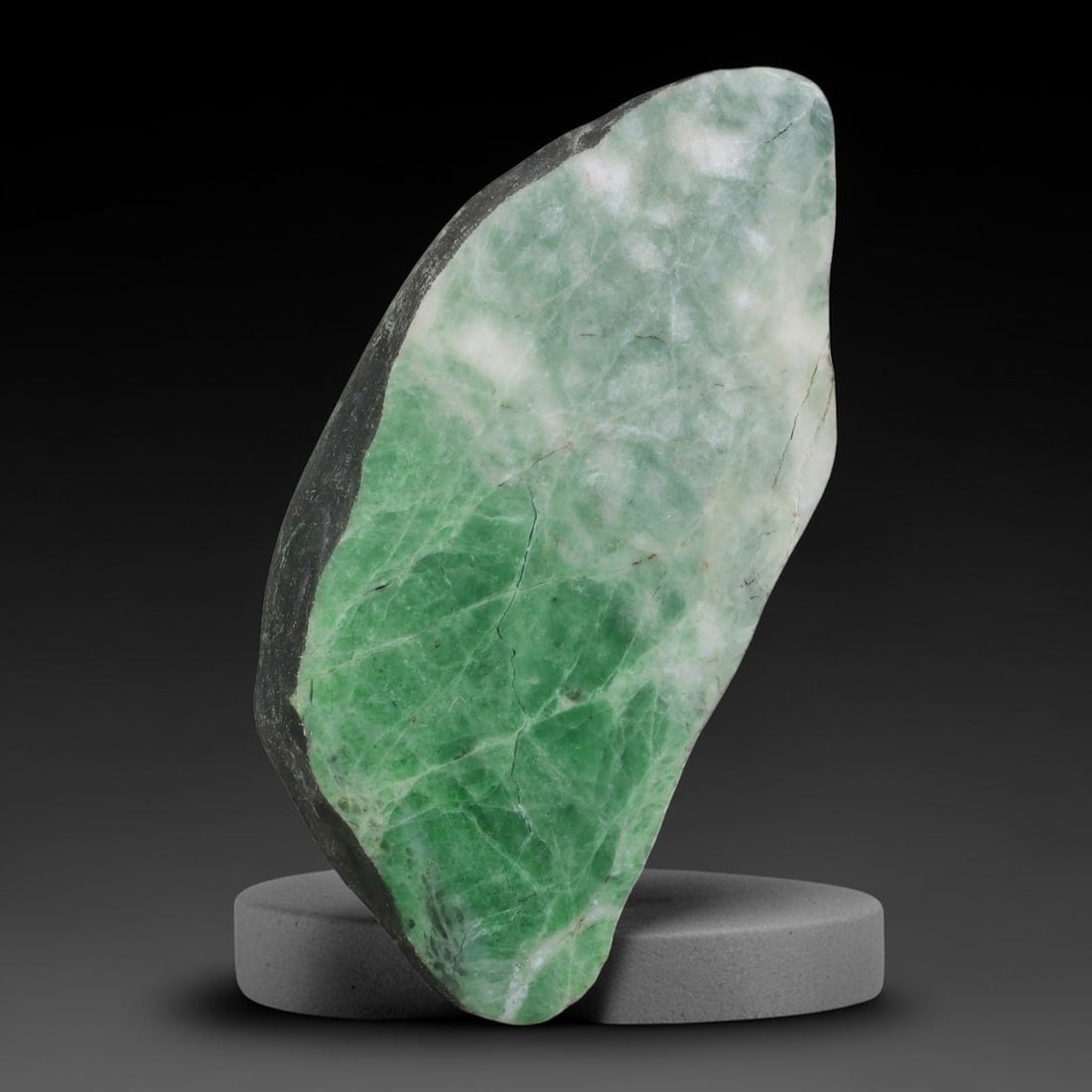 222ct Natural Type A Burmese Jadeite Jade Sliced Rough, 7YN: This specimen is a sliced rough block of natural Type A Burmese jadeite jade. The interior displays natural colour zoning with visible mineral veining and crystalline patterns typical of unprocessed j