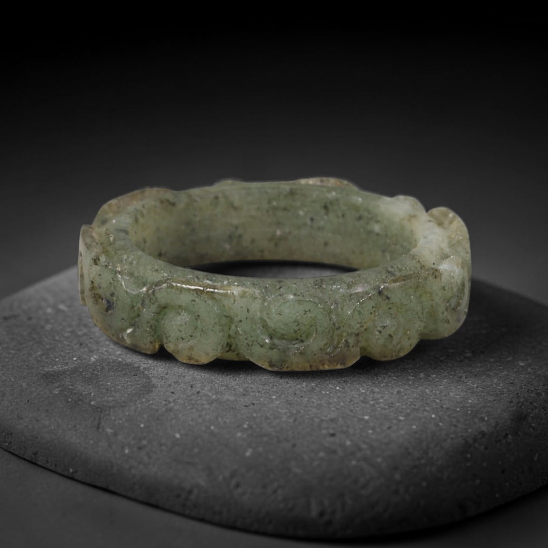 Natural Burmese Type A Jadeite Jade Carving Band Ring Size US 9, 21TB: Carved from untreated natural Burmese Type A jadeite jade, this carved stone band holds a soft polished finish showcasing milky pale base hues interspersed with warm natural brown mineral patina patch