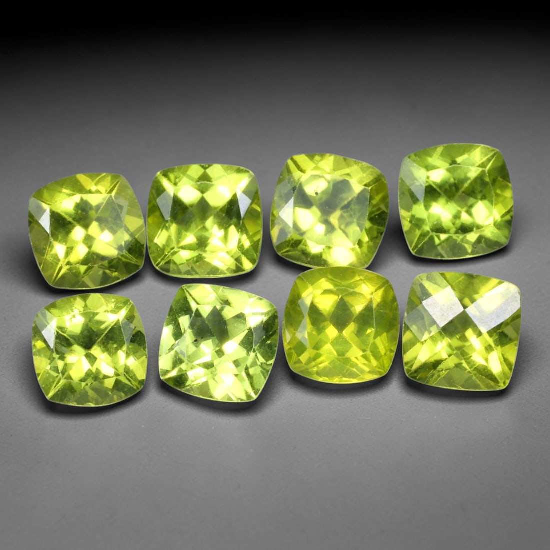 8.30ct Natural Peridot Cushion Faceted Parcel Loose Gemstone, 2WW: Matching parcel of hand faceted natural peridot gemstones featuring vibrant consistent lime-green body tone with subtle natural internal mineral characteristics visible throughout each stone. Every ge