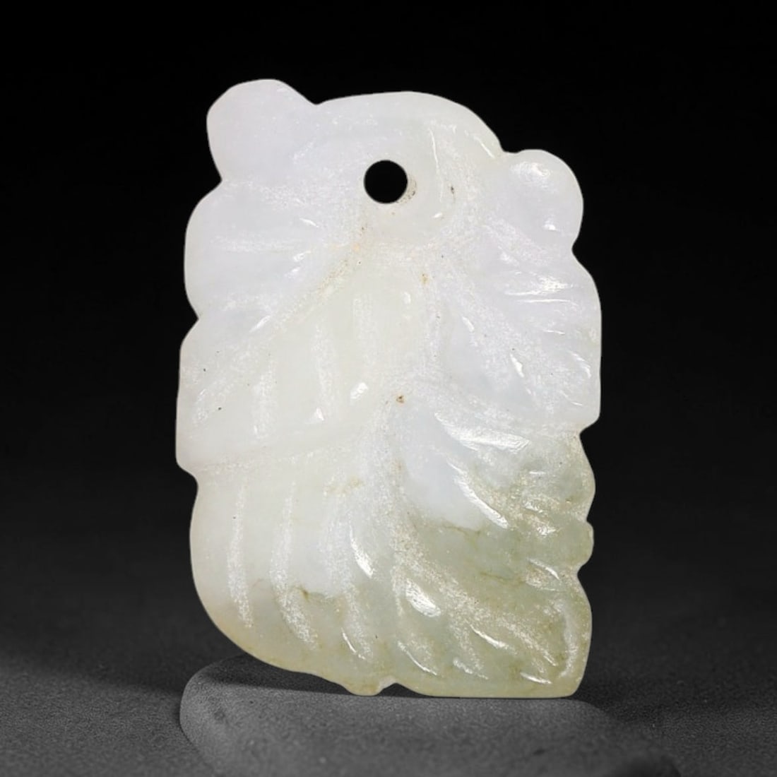 Natural Burmese Type A Jadeite Jade Hand Carved Pendant, 43TC: Artisan hand-carved untreated Burmese Type A jadeite jade pendant measuring 22.8x14 mm. Carefully sculpted with detailed relief craftsmanship and finished with a smooth glossy polish. Authentic Type A