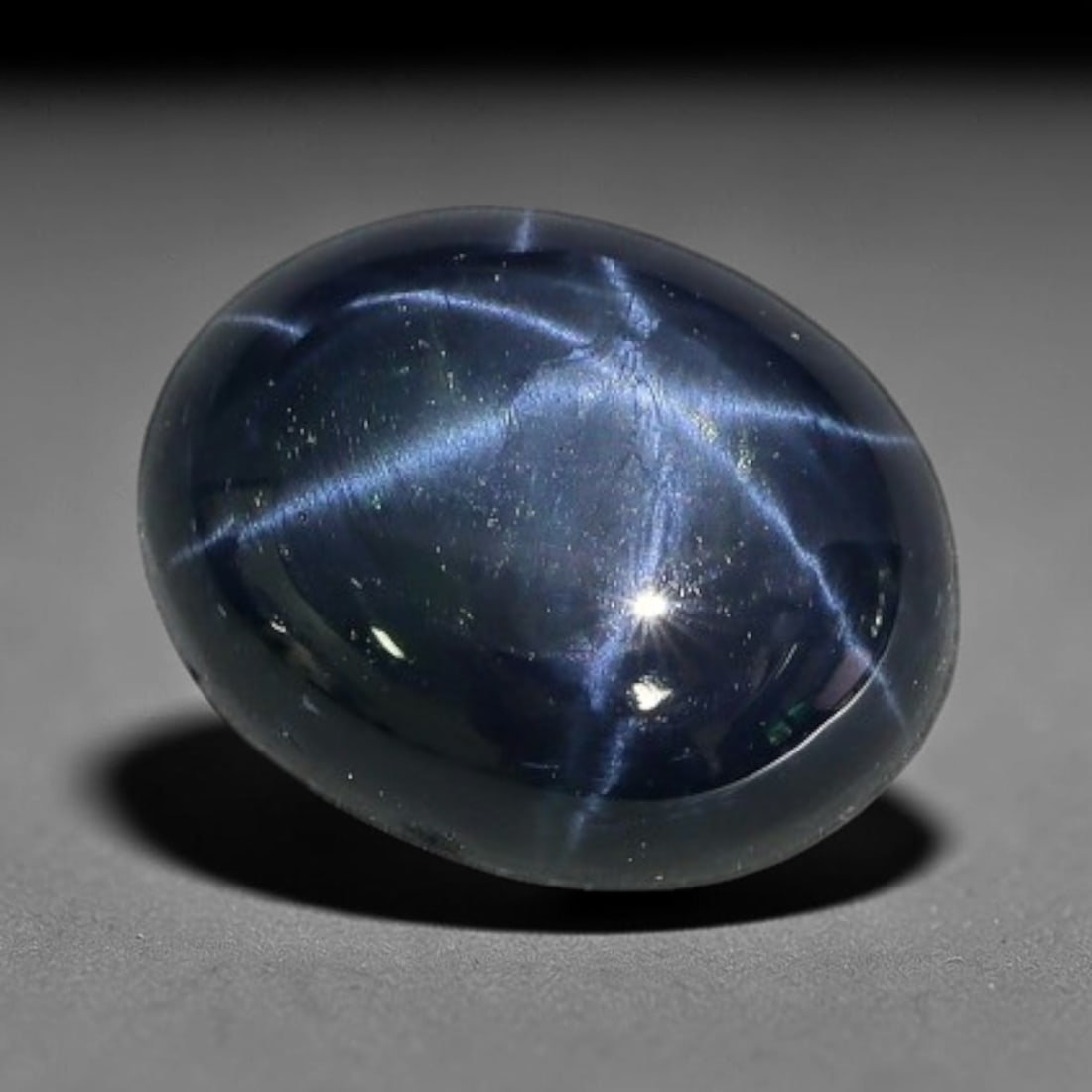 2.70 Carats Natural 6 Ray Blue Star Sapphire Loose Gemstone, 45XX: This star sapphire is crafted from natural corundum deposits and refined into a sleek polished cabochon form through professional lapidary finishing procedures. The distinct six-ray star asterism disp