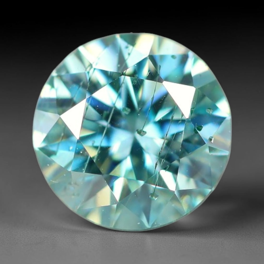 0.80 Carats Aqua Toned Moissanite Loose Gemstone, 57WP: This moissanite features dimensional measurements of 6x3.7mm, lab-grown silicon carbide material valued for superior light refraction that delivers vivid multi-hued sparkle across all lighting conditi