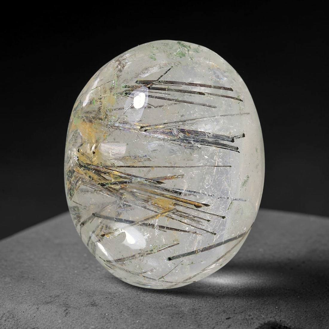 21.51ct Natural Brazilian Black Rutile Quartz Cabochon Loose Gemstone, 13YX: This polished cabochon of natural rutile quartz features countless distinct slender black rutile needle inclusions suspended within the clear quartz host crystal. The smooth domed surface enables full