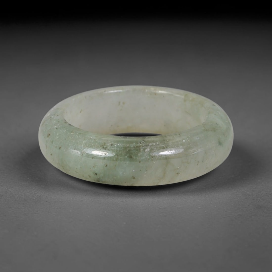 Natural Burmese Type A Jadeite Jade Band Ring Size US 10, 34TB: Crafted from untreated natural Burmese Type A jadeite jade, this solid stone band features a high-gloss polished finish displaying consistent deep green mineral tones interwoven with natural subtle to