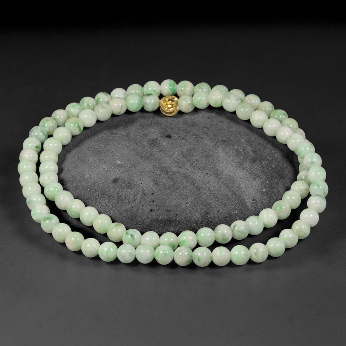 Natural Burmese Type A Floating Green Blossom Jadeite Jade Beaded Necklace, 21TF: Crafted from natural Burmese type-A jadeite, this beaded necklace features smoothly polished round beads measuring 6.8mm. Pale milky-white bead bodies are accented by soft floating patches and streaks