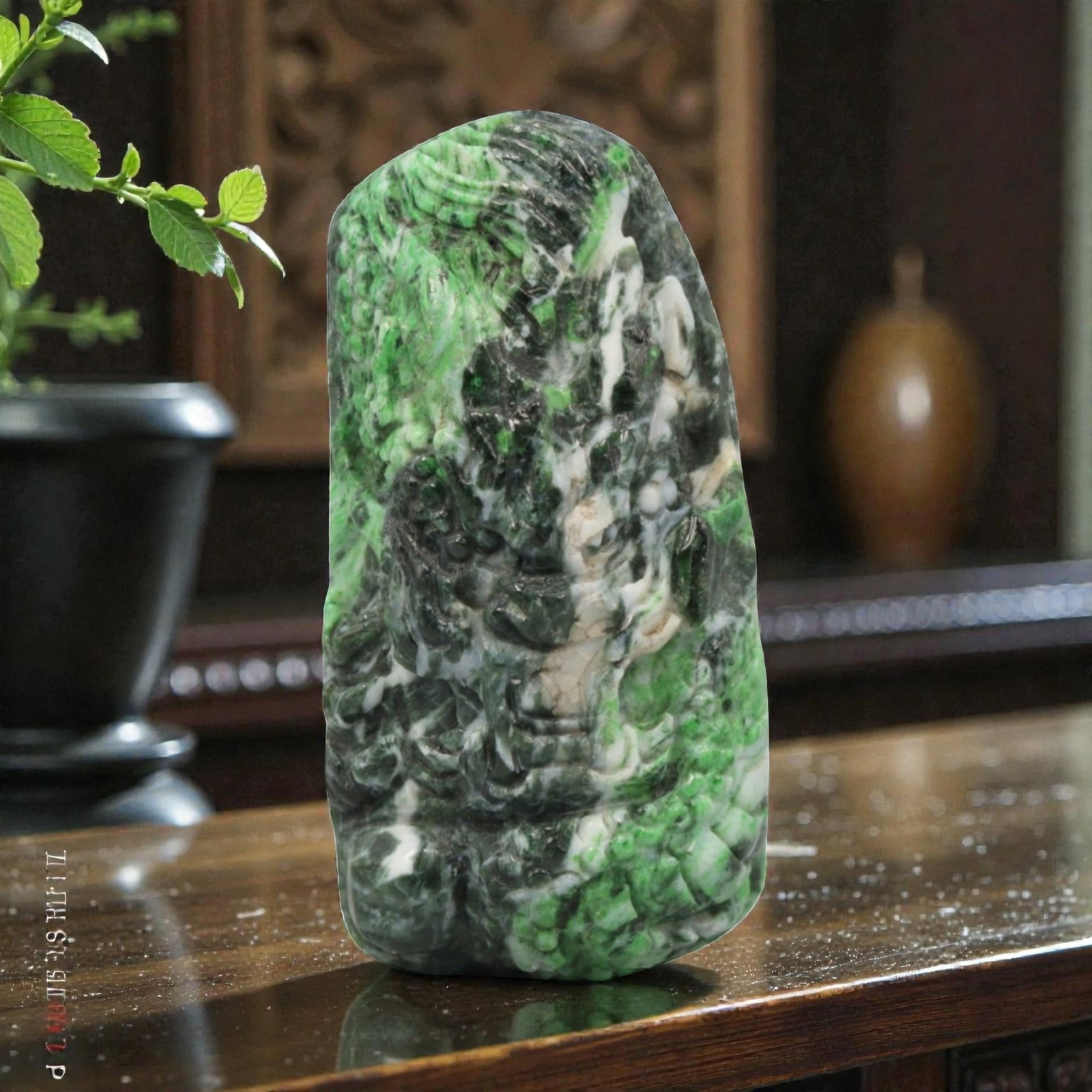Natural Burmese Type A Maw Sit Sit Dragon Pendant, 20th Century, 12ZL: Carved from green maw sit sit with natural white and dark inclusions distributed throughout the matrix, the pendant is formed as an irregularly rectangular object with a relief-carved dragon head moti