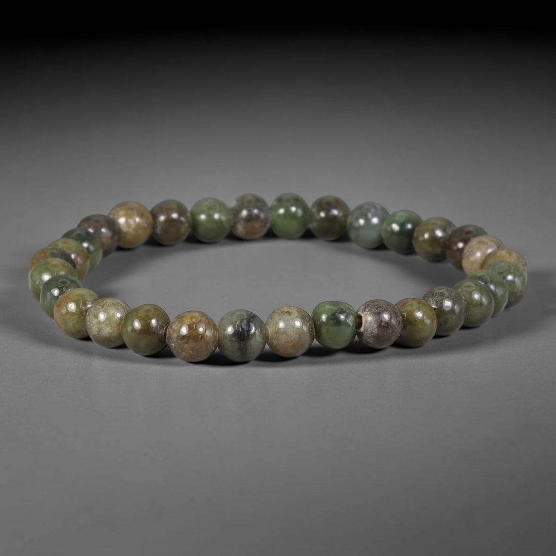 Natural Burmese Type A Earthy Multitone Green & Brown Mixed Jadeite Jade Beaded Bracelet, 26TA: Crafted from untreated natural Burmese Type A jadeite jade beads with maximum bead dimension of 6.05mm, this slim single-loop bracelet features uniformly polished round beads with rich earthy mixed to