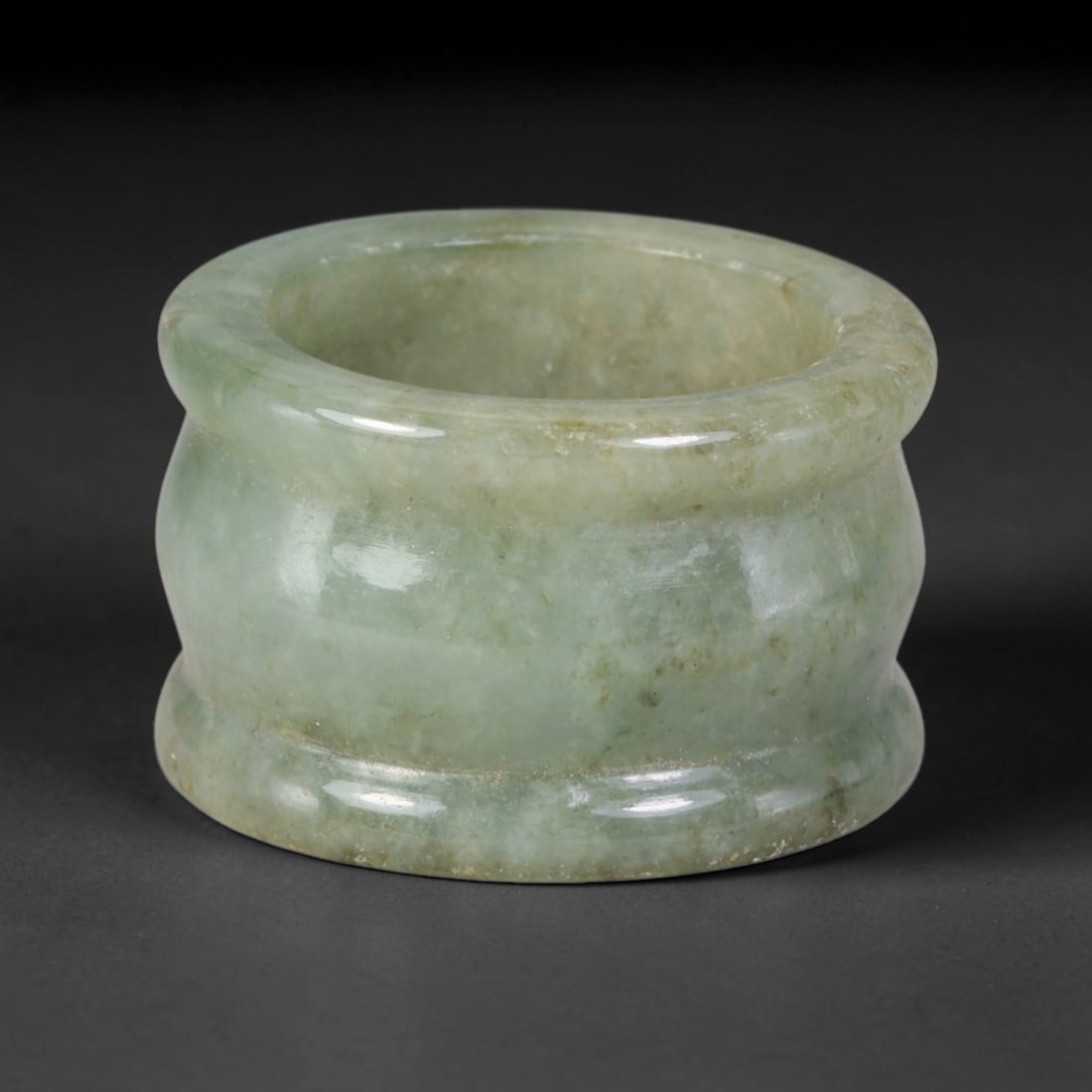 Natural Burmese Type A Jadeite Jade Band Ring Size US 9.50, 9TB: Fashioned from untreated natural Burmese Type A jadeite jade, this solid stone band carries a smooth polished finish showcasing milky pale base tones blended with soft natural green mineral undertones
