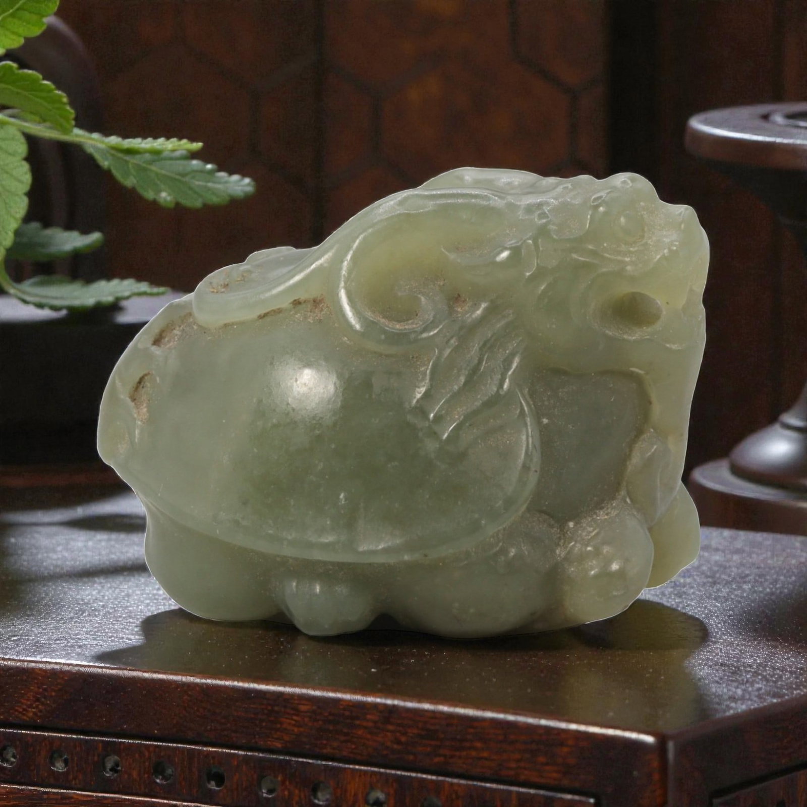 A Chinese Hetian Nephrite Light Green Jade Dragon Turtle Figurine, 3YA: I've got a real nice little treasure here to show you , this hand-carved jade dragon turtle is just full of charm!This one's a solid, smooth piece weighing 143 carats, measuring 31x26x23mm. The color'