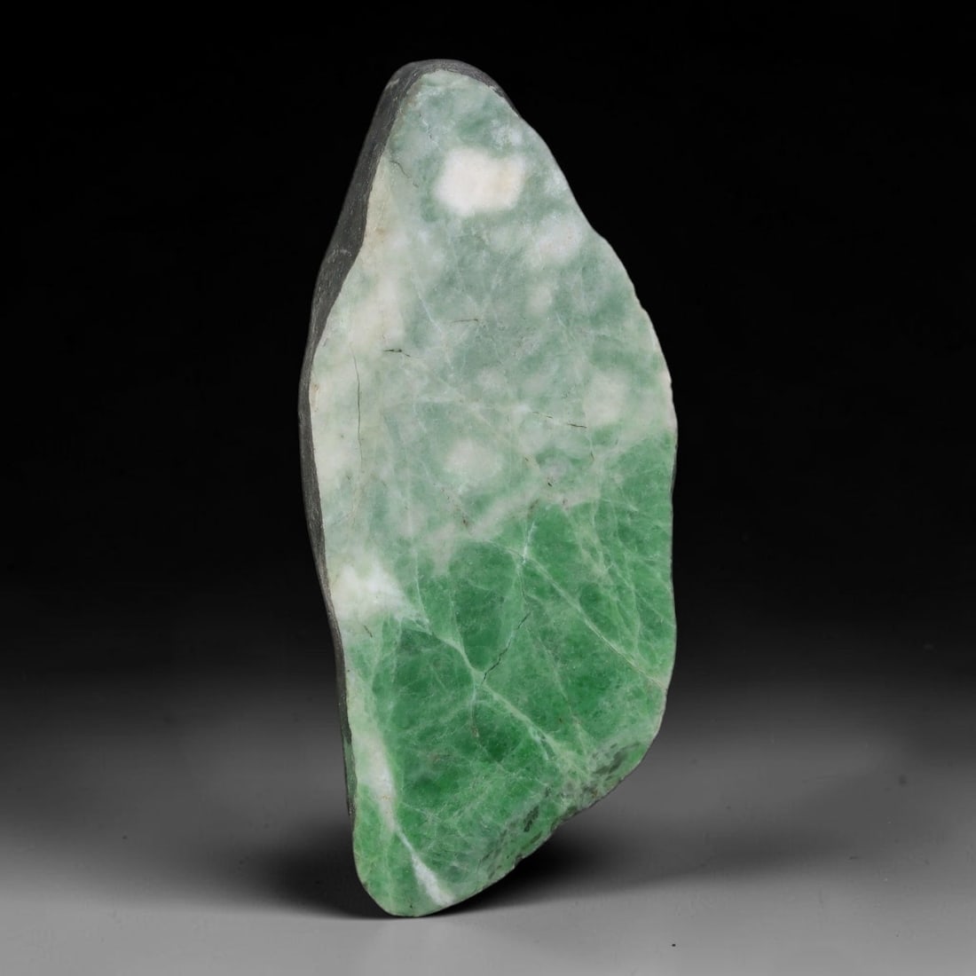 187ct Natural Type A Burmese Jadeite Jade Sliced Rough, 4YN: This specimen is a sliced rough block of natural Type A Burmese jadeite jade. The interior displays natural colour zoning with visible mineral veining and crystalline patterns typical of unprocessed j