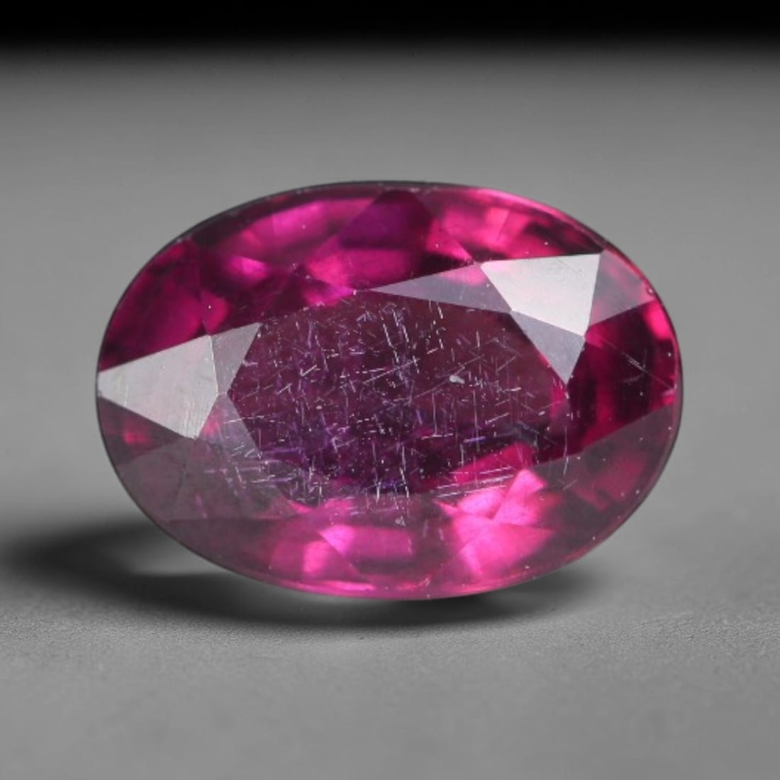 1.26 Carats Natural Rich Magenta Red Garnet Oval Faceted Loose Gemstone, 36WW: This garnet originates from natural geological mineral deposits and undergoes precise faceting and high-gloss reflective polishing via professional lapidary craftsmanship. Minute pinpoint mineral spec