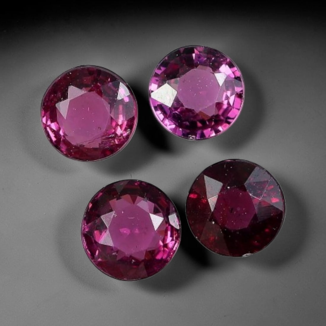 3.07 Carats Natural Rhodolite Garnet Round Faceted Parcel Lot, 10XZ: Come take a look at this lovely batch of four matching round rhodolite garnets, rich with eye-catching pinkish-purple color. This full parcel totals 3.07 carats, each round stone measuring roughly 5.3