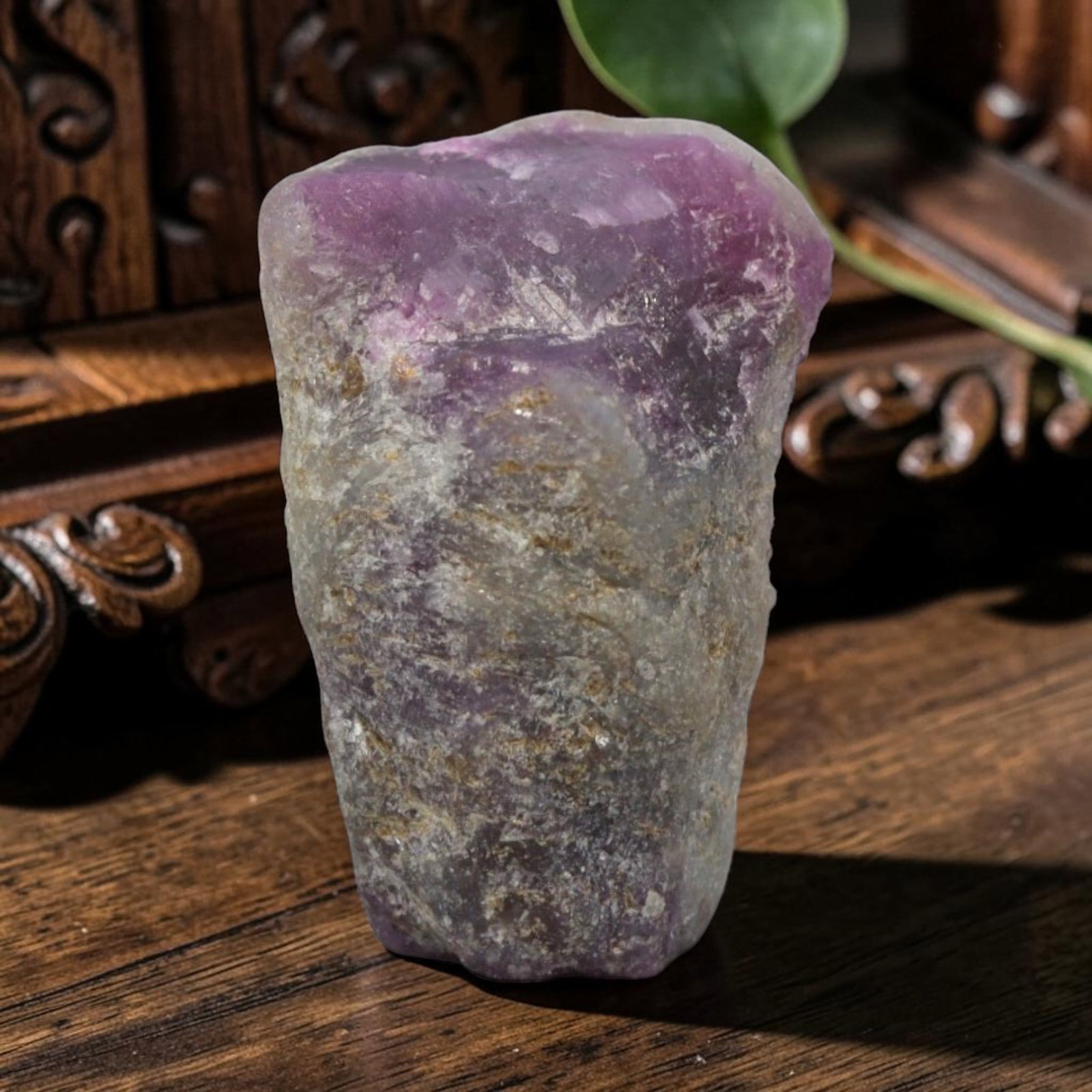 29.14ct Natural Mauritania Ruby Rough (Unheated), 87XE: This unheated Mauritania ruby rough is a captivating natural crystal specimen, featuring vivid magenta-purple ruby formations embedded in a contrasting greyish matrix. The stone's rugged, unpolished s