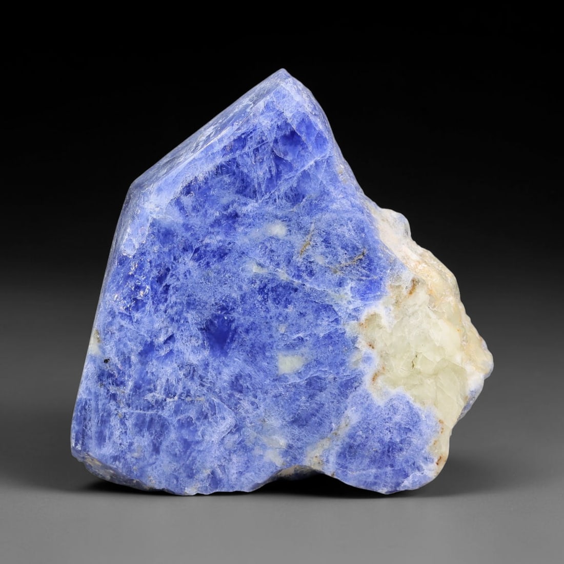 97.51 Carats Natural White Matrix Blue Sodalite Sliced Rough Stone, 71YR: This genuine natural sodalite sliced rough features rich deep blue mineral matrix interspersed with pale creamy white crystalline formations formed through igneous geological processes. Fine natural o