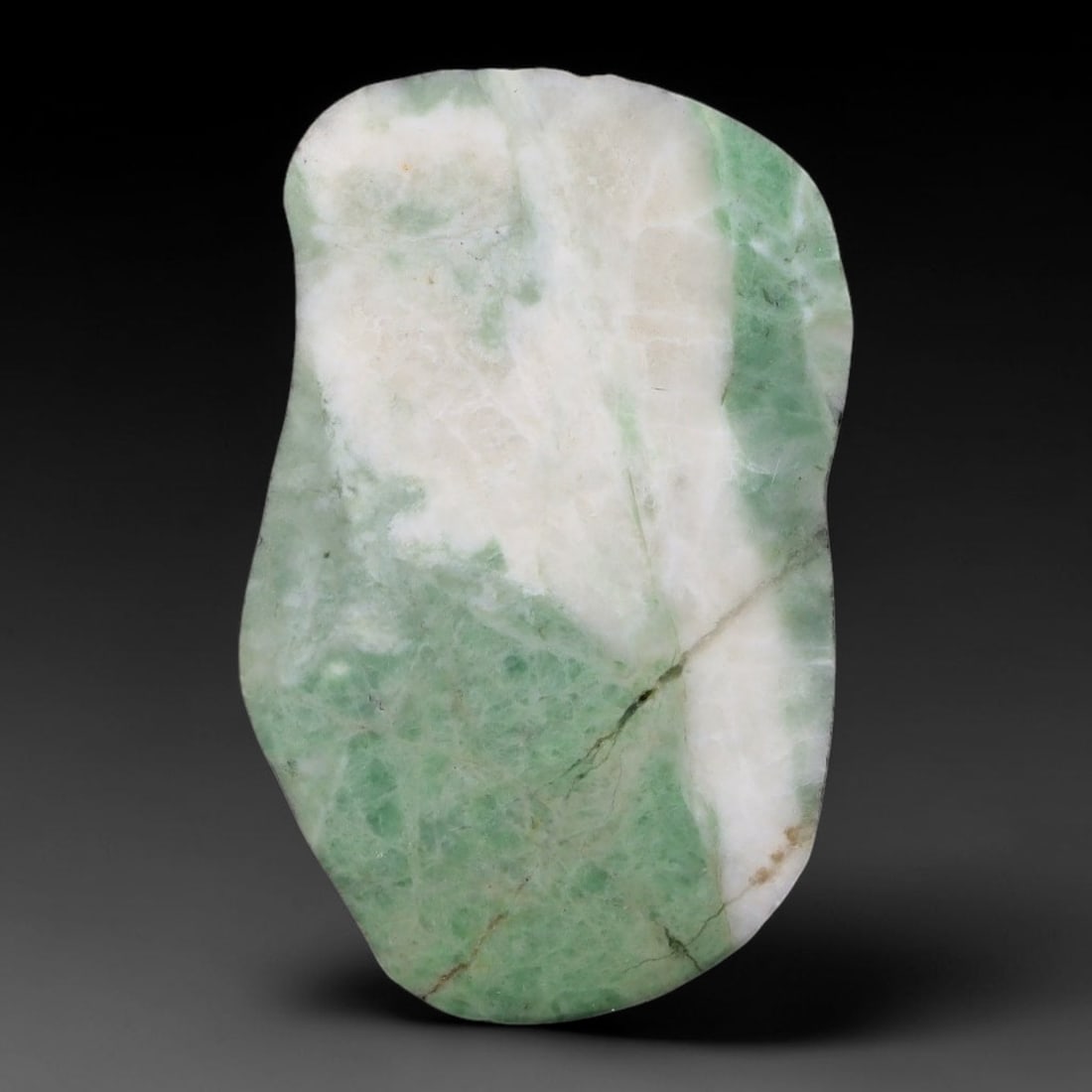 79ct Natural Type A Burmese Jadeite Jade Sliced Rough, 90YN: This specimen is a sliced rough block of natural Type A Burmese jadeite jade. The interior displays natural colour zoning with visible mineral veining and crystalline patterns typical of unprocessed j