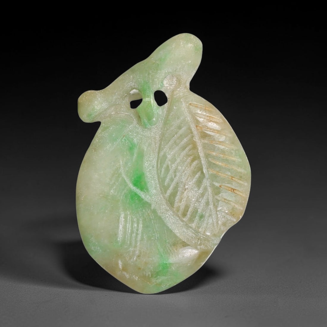 Natural Burmese Type A Jadeite Jade Hand Carved Pendant, 41TC: Artisan hand-carved untreated Burmese Type A jadeite jade pendant measuring 27x22.8 mm. Carefully sculpted with detailed relief craftsmanship and finished with a smooth glossy polish. Authentic Type A