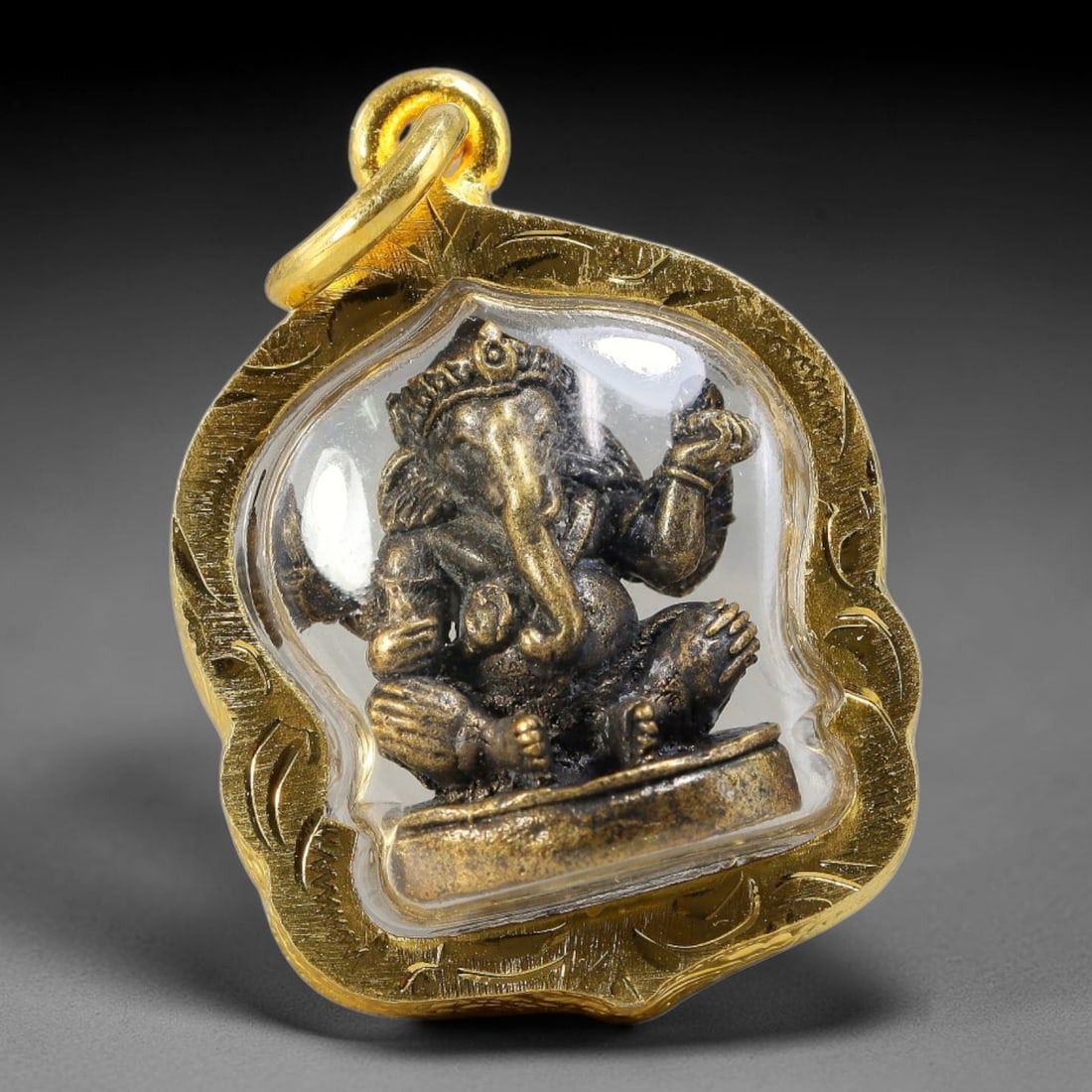 Thai Money Bag Shaped Luang Phor Monk Dual-Sided Gold Plated Metal Casing Amulet, 49YY: Classic wealth pouch money bag shaped Thai monk amulet sealed under transparent cover, housed within fully hand-carved gold-plated metal casing fitted with an ornate decorative bail loop. The front fe