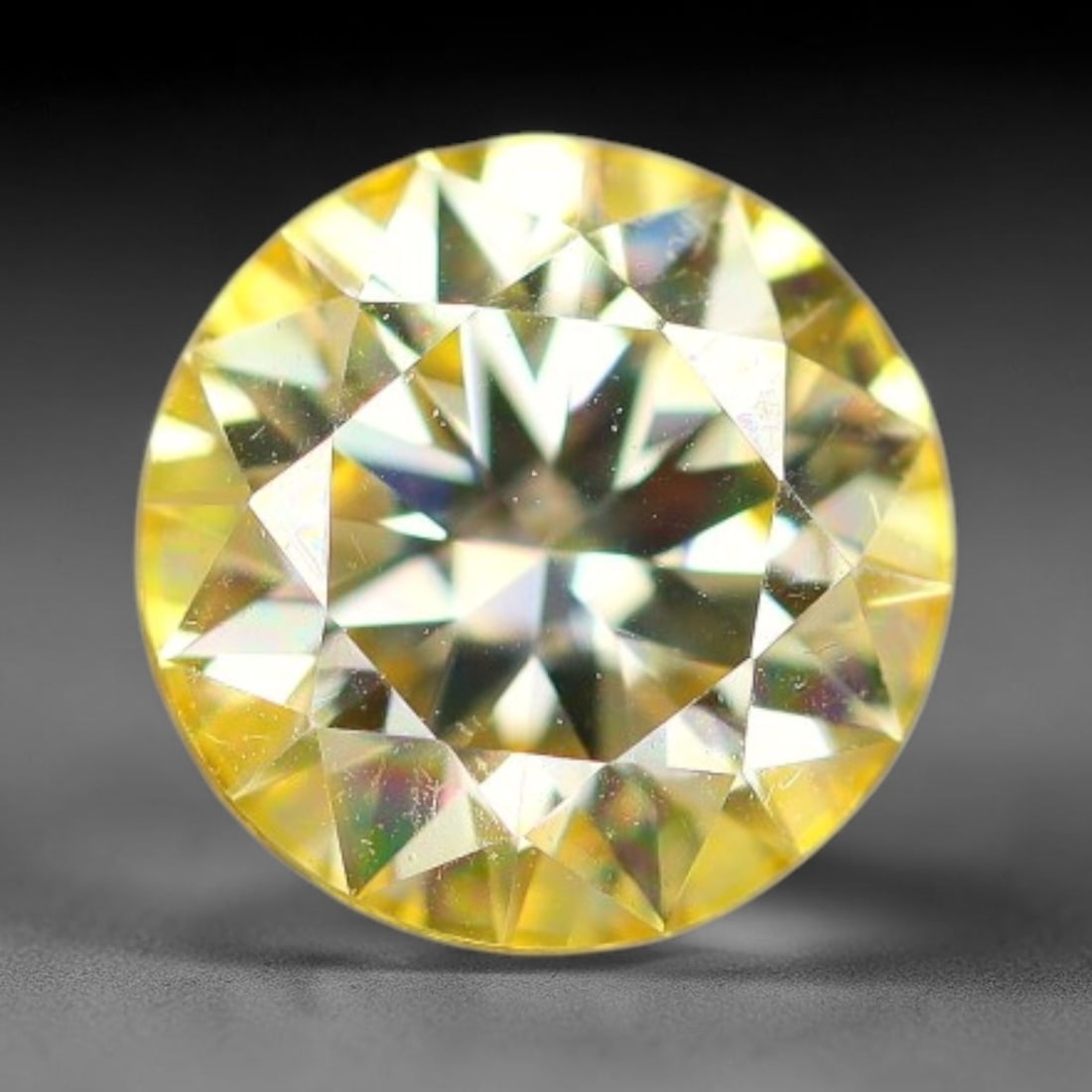 0.98 Carats Yellow Moissanite Loose Gemstone, 34WP: This yellow moissanite features dimensions of 6.4x4mm, crafted from high performance silicon carbide material famous for exceptional light refraction and brilliant light dispersion that creates intens