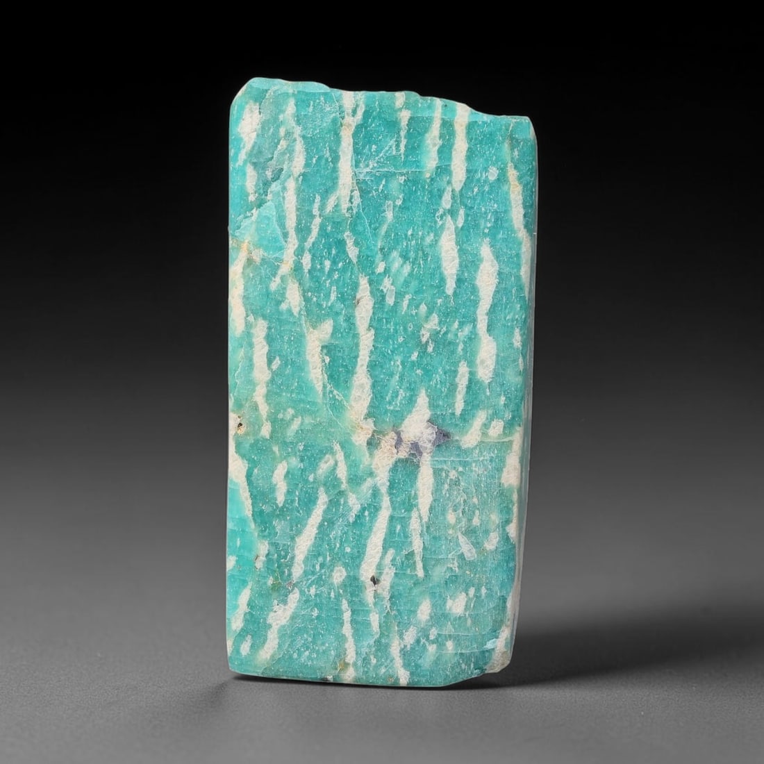 62ct Natural Russian Ural Amazonite Slab Rough, 68WV: This intact amazonite slab features distinct parallel mineral banding running uniformly across its naturally split flat surface within 41x20x9mm slab dimensions, retaining unmodified natural geologica