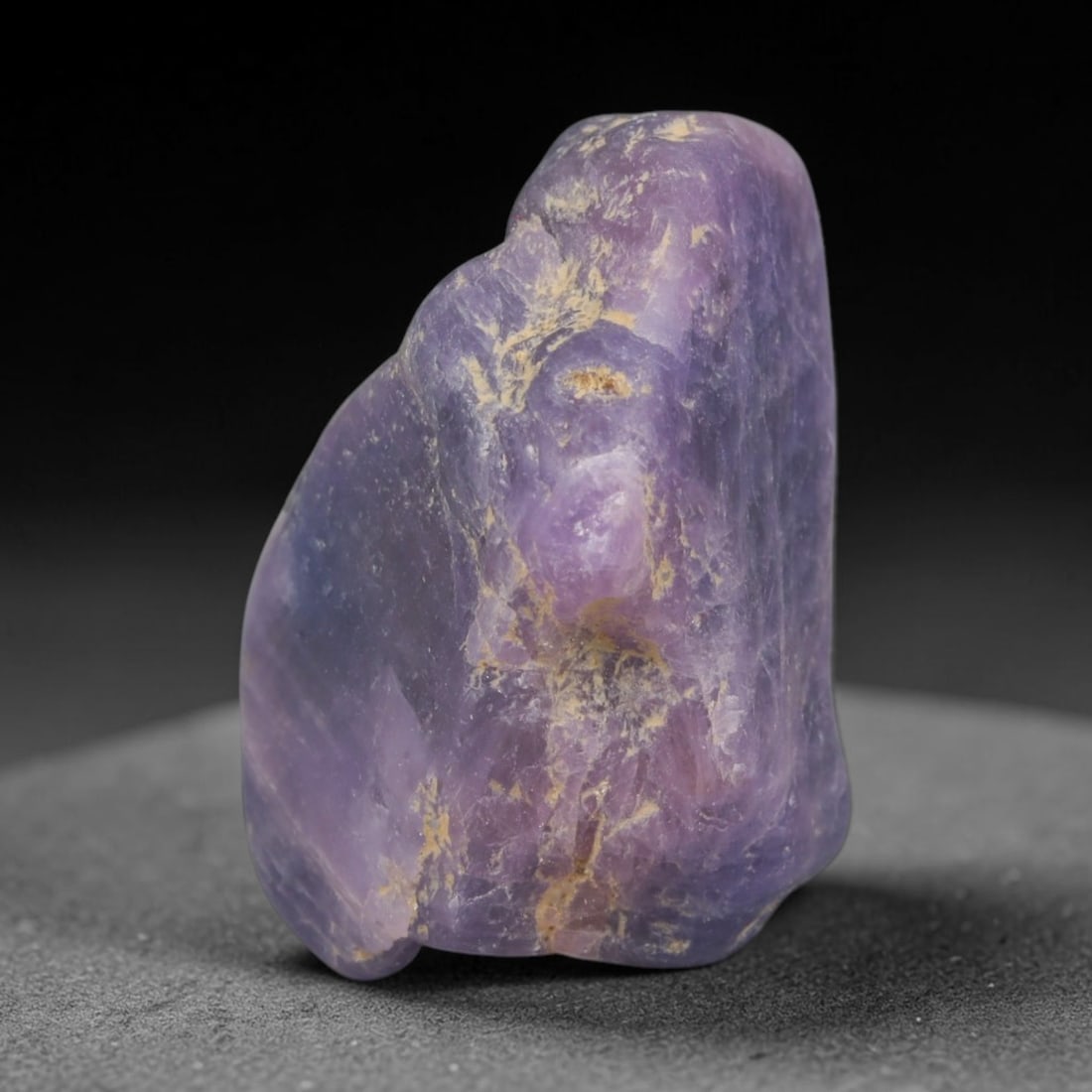 40ct Natural Unheated Sri Lankan Purplish Blue Sapphire Rough, 66YQ: This natural corundum rough is an unheated purplish blue sapphire sourced from Sri Lankan alluvial gem deposits, featuring an irregular natural native form with residual pale yellow-brown mineral matr