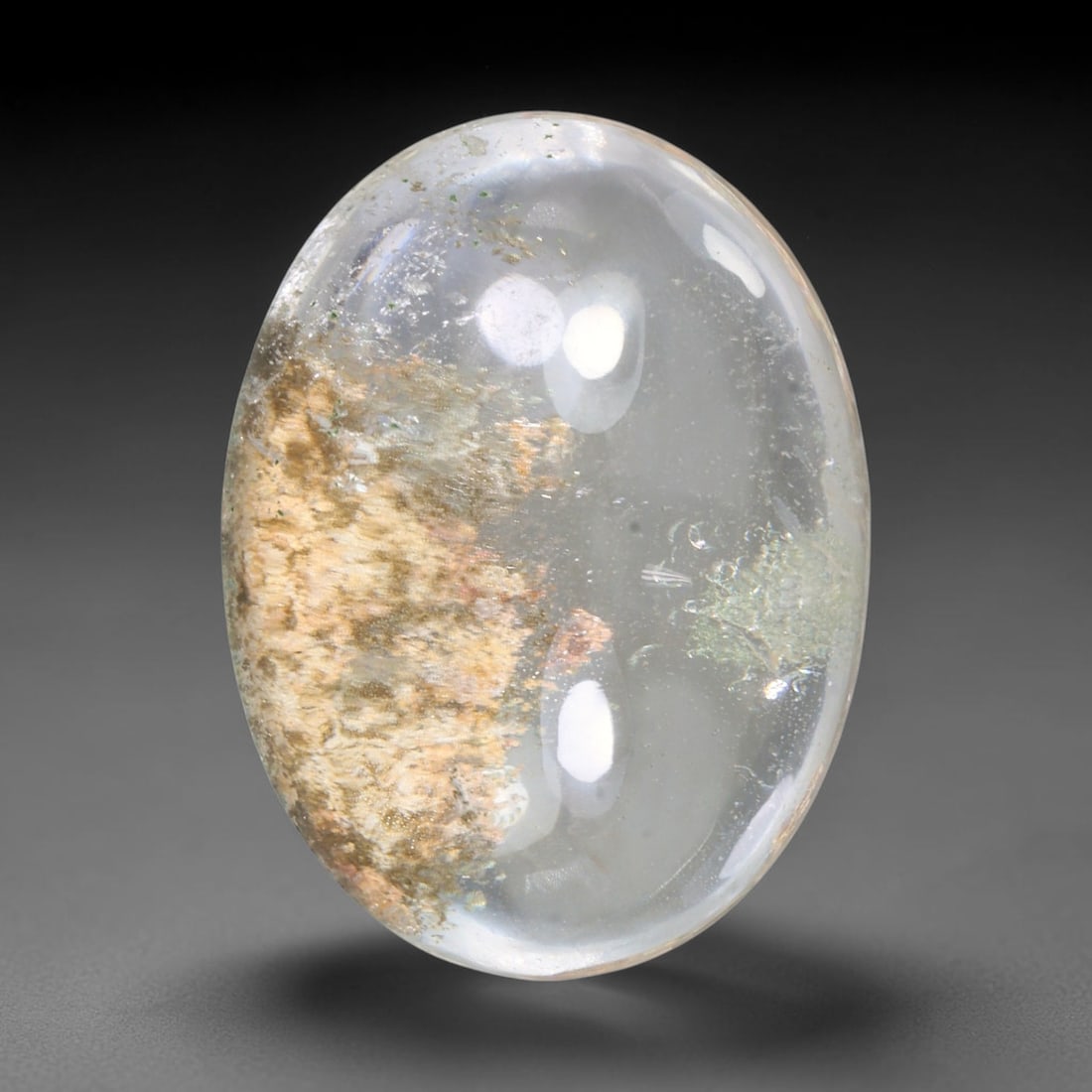 28.90ct Natural Brazilian Phantom Quartz Oval Cabochon Loose Gemstone, 68YX: This smoothly polished cabochon of natural phantom quartz preserves delicate layered phantom crystal formations enclosed inside transparent quartz host. The domed polished surface offers unobstructed 