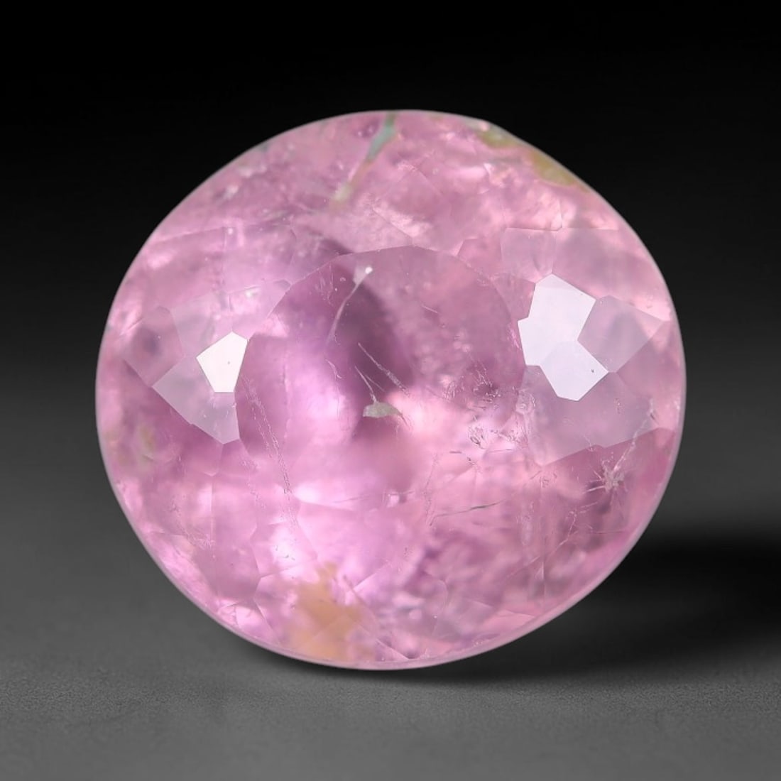 1.78 Carats Natural Pink Tourmaline Faceted Loose Gemstone, 70XZ: This specimen is formed of natural tourmaline, fitted with consistent faceting to enhance light movement within its crystalline interior. The stone carries soft pink tonal saturation with mild natural