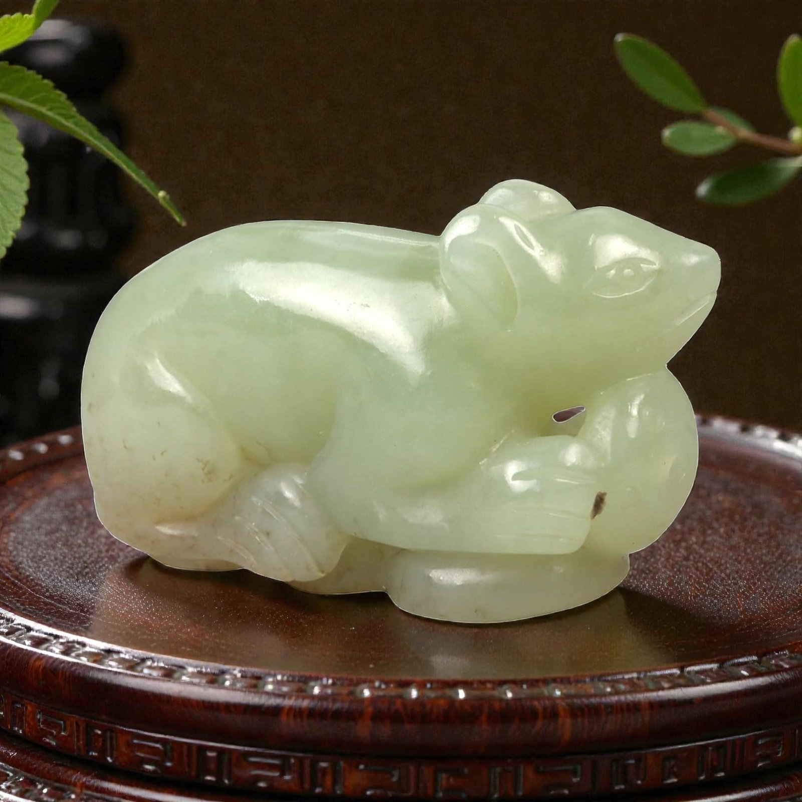 Chinese Jade Mouse - Carved Animal Figurine 3.8cm, 84ZC: Carved from pale green jade with milky translucency and gentle tonal variation, this small sculptural figure represents a mouse rendered in a compact crouching posture. The carving is executed fully i