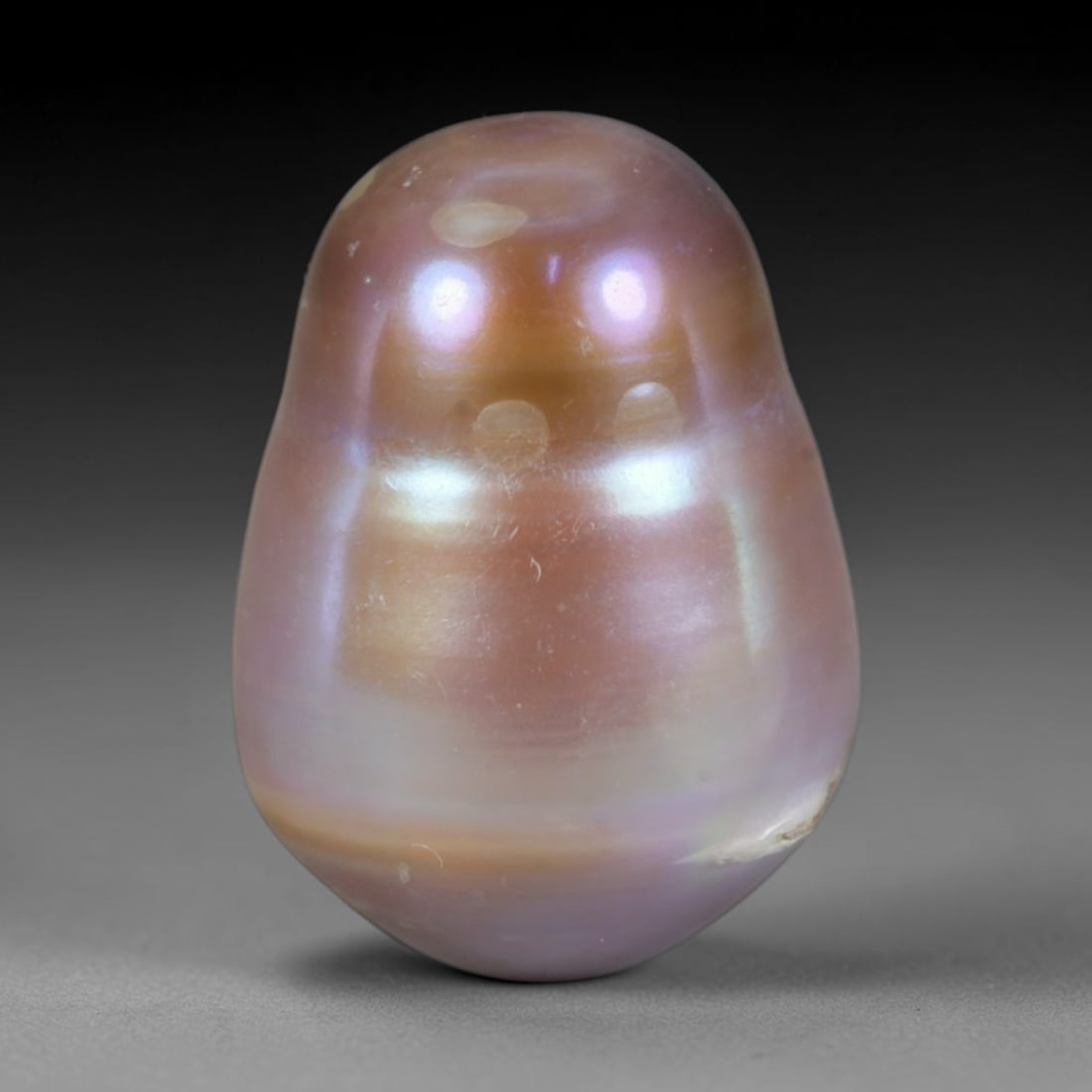 Natural Freshwater Baroque Pearl - Dusty Lavender Blush Organic Form, 76WE: This natural freshwater baroque pearl holds a smooth asymmetrical organic silhouette coated in luminous iridescent nacre, featuring rich dusty lavender blended with warm blush bronze shifting overtone
