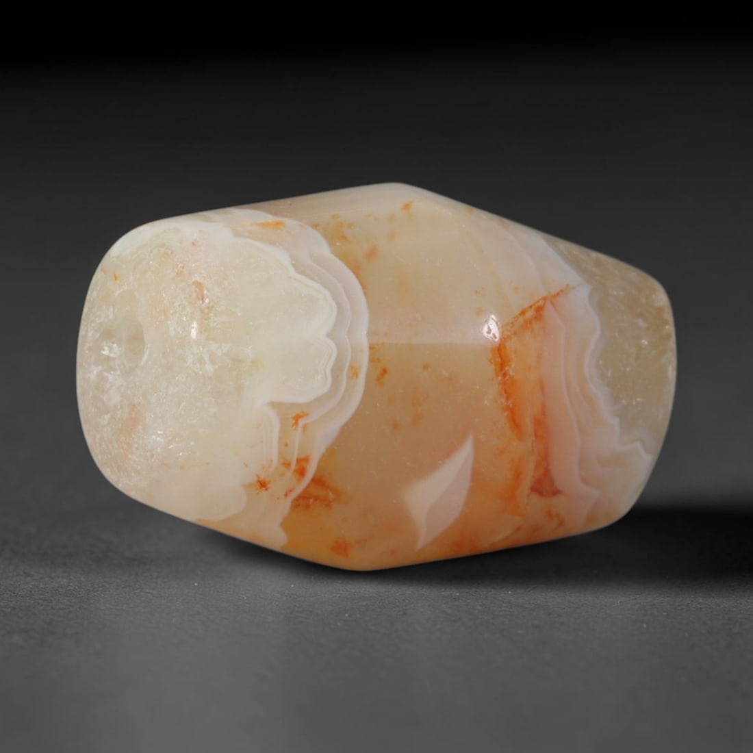 Ancient Phoenician Canaanite Culture Banded Agate Bicone Bead (3000-300 BCE), 66XD: This antique faceted bicone banded agate bead originates from Canaanite & Phoenician Cultures, maritime Levantine traders who manufactured and exported polished chalcedony beads across the Mediterrane