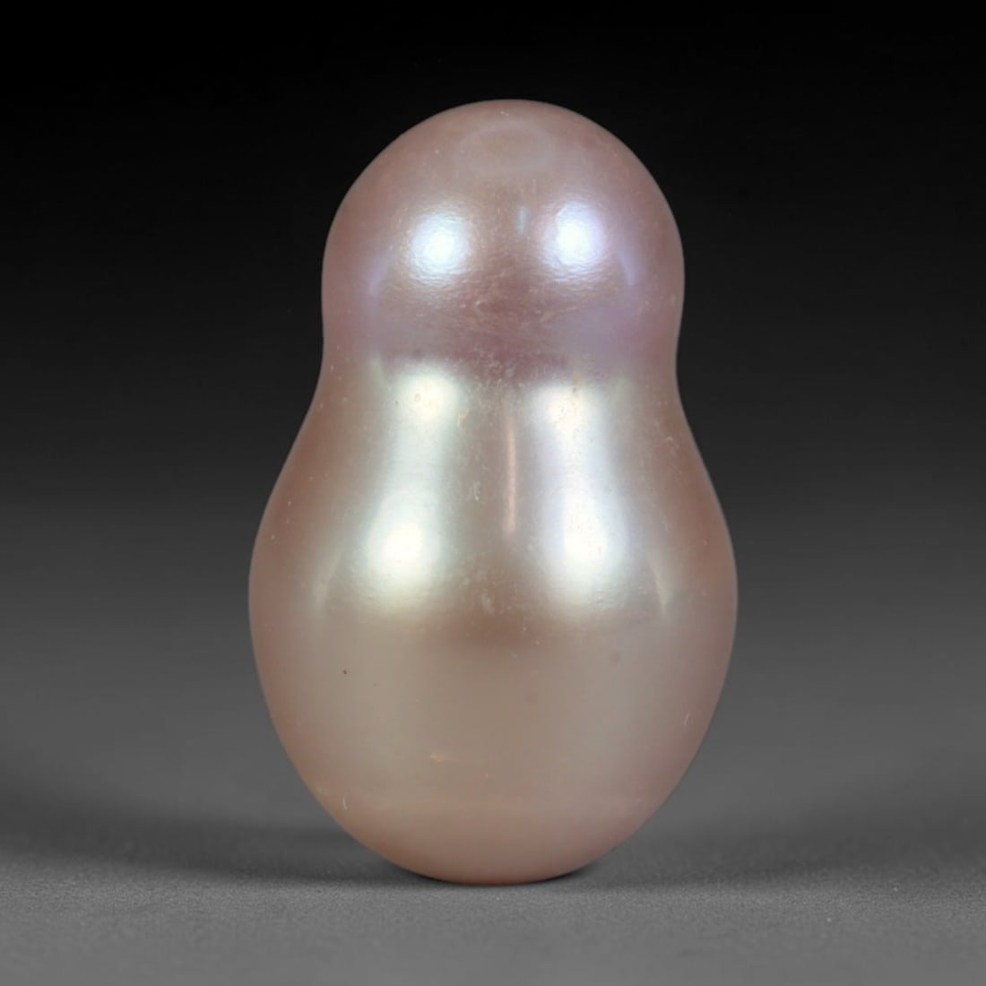 Natural Freshwater Baroque Pearl - Muted Blush Lavender Gourd Organic Form, 77WE: This natural freshwater baroque pearl presents a smooth gourd-shaped organic silhouette enveloped in soft luminous iridescent nacre, showcasing muted blush pink blended with faint lavender overtones a