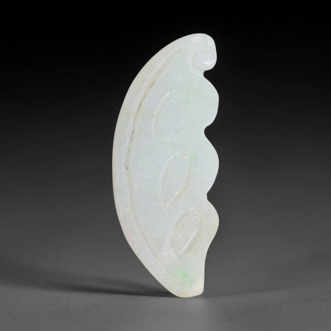 Natural Burmese Type A Jadeite Jade Hand Carved Pendant, 35TC: Artisan hand-carved untreated Burmese Type A jadeite jade pendant measuring 35x14.5 mm. Carefully sculpted with detailed relief craftsmanship and finished with a smooth glossy polish. Authentic Type A