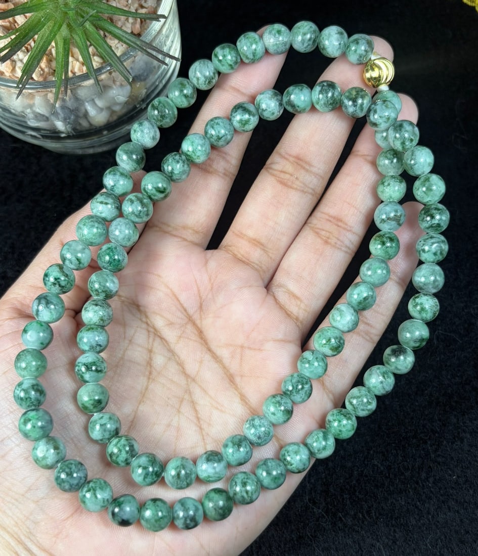 Natural Burmese Type A Grass Green Speckled Jadeite Beaded Necklace, 30YM: Hand-strung natural Burmese Type A jadeite round beads covered with fine scattered grass-green speckles across a pale translucent base, forming classic moss-in-snow texture. Every bead is evenly shape