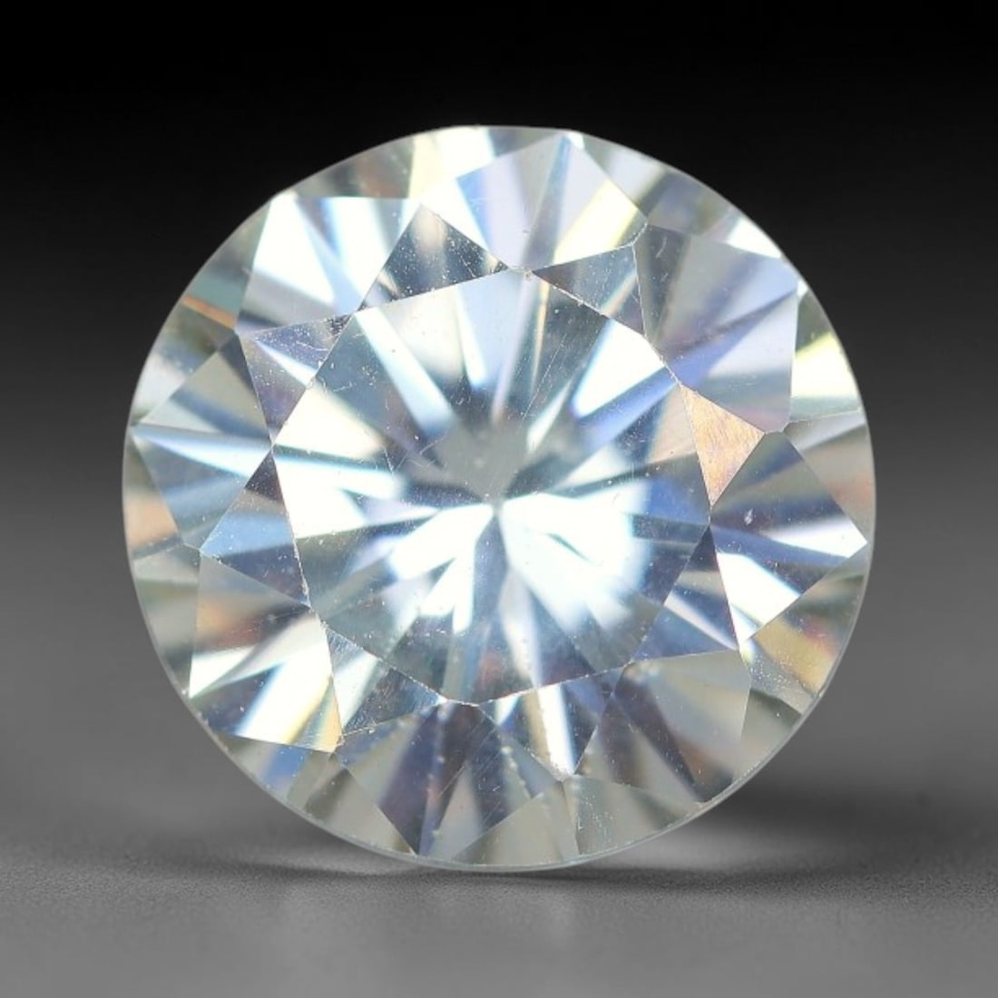 3.22 Carats Clear Moissanite Loose Gemstone, 51WP: This moissanite has dimension measurements of 9.7x6mm, a lab produced silicon carbide gem material celebrated for superior refractive index that delivers outstanding light dispersion and vivid sparkle