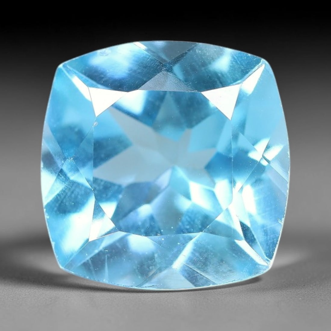 10.37 Carats Natural Brazilian Sky Blue Topaz Cushion Faceted Loose Gemstone, 36XY: Constructed from genuine natural topaz sourced from Brazilian mineral deposits, the raw material has been refined through professional faceted lapidary processing with consistent glossy polishing acro