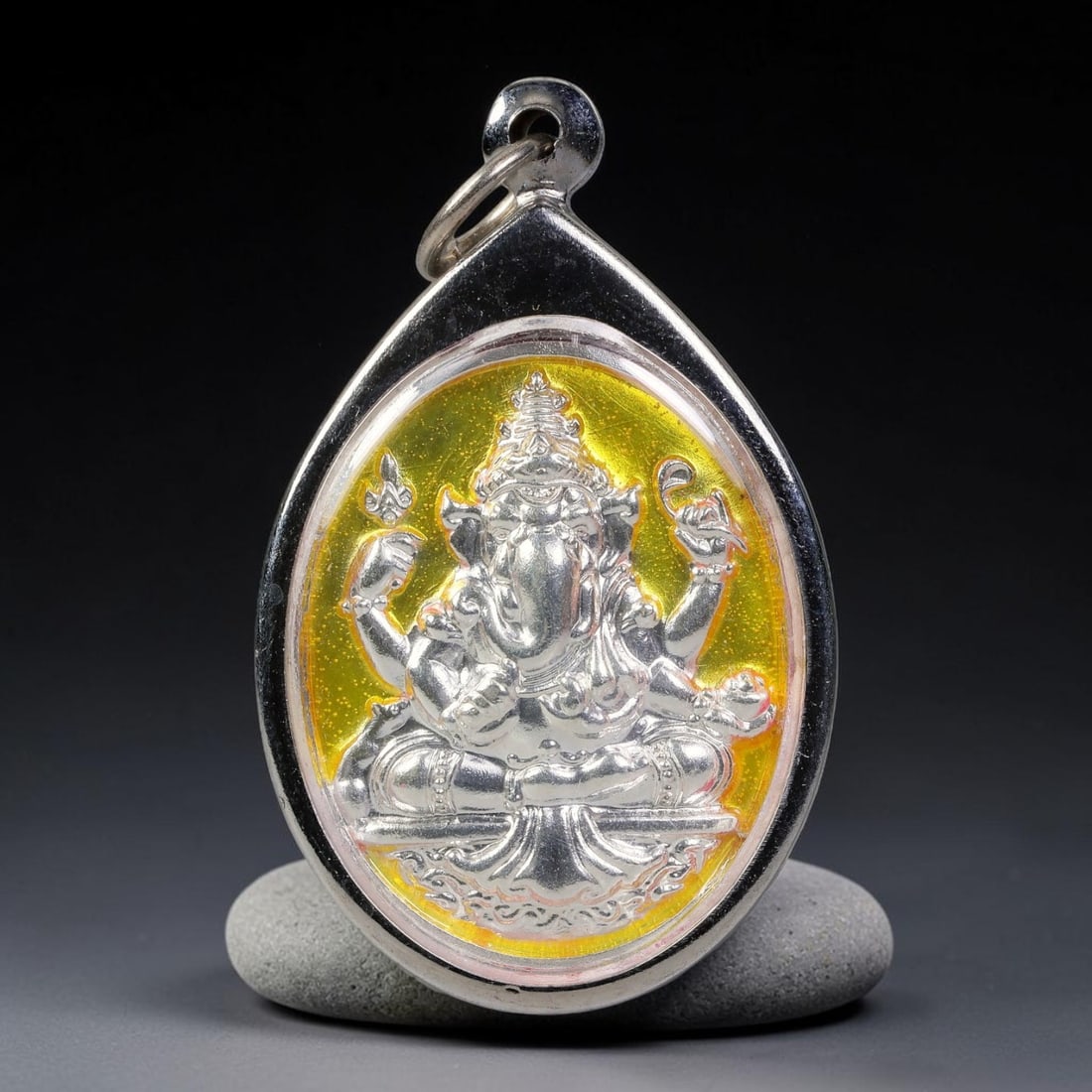 Thai Ganesha Elephant God Dual-Sided Silver Plated Metal Casing Amulet, 61YY: Teardrop-shaped Thai Ganesha deity amulet with silver metal core sealed under clear transparent cover, encased in hand-polished silver-plated metal casing with matching silver-toned metal loop. Size: 