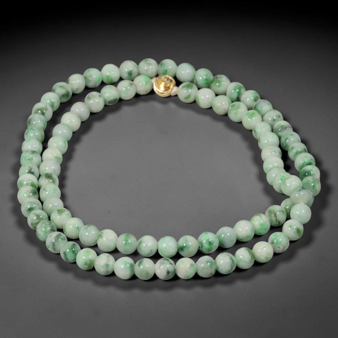 Natural Burmese Type A Pale Floating Jadeite Jade Beaded Necklace, 13WY: Constructed from unprocessed Burmese Type A jadeite stone, each spherical bead displays soft scattered green mineral flecks naturally integrated into the pale stone matrix through geological formation